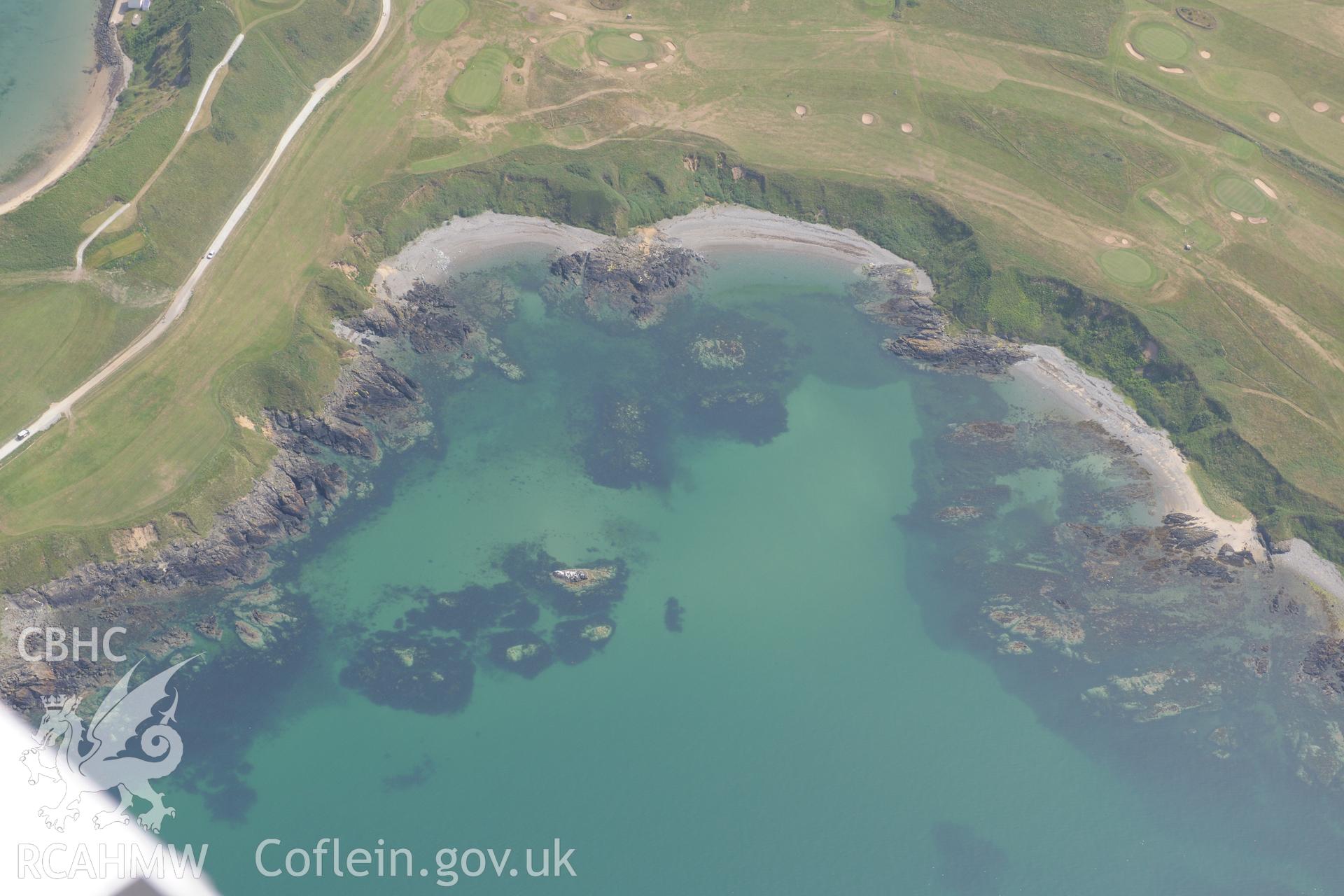 Trwyn Porth Dinllaen Promontory Enclosure, Porth Dinllaen, Morfa Nefyn, on the Lleyn Peninsula. Oblique aerial photograph taken during the Royal Commission?s programme of archaeological aerial reconnaissance by Toby Driver on 12th July 2013.