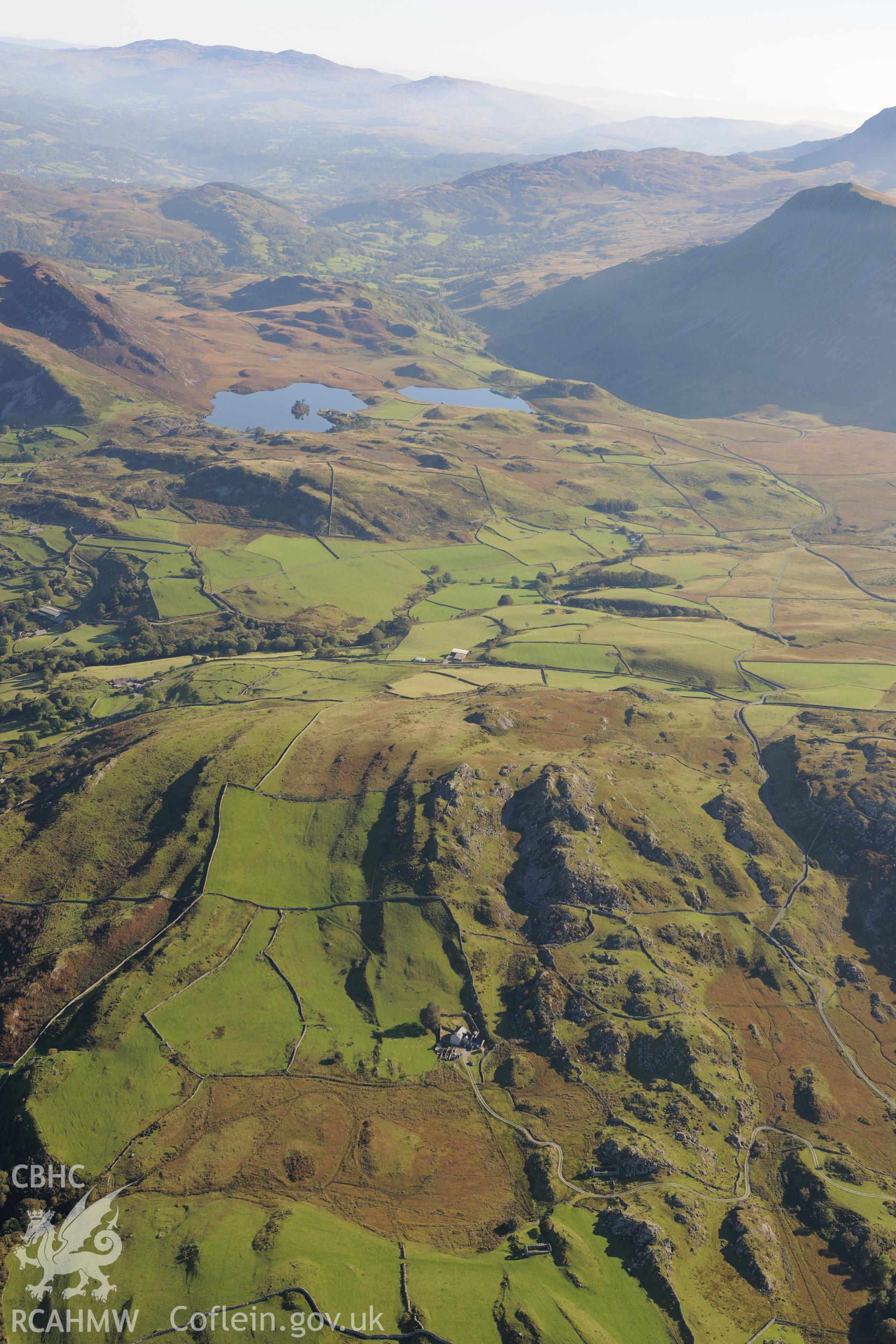 Cadair Idris and Llynnau Cregennen. Oblique aerial photograph taken during the Royal Commission's programme of archaeological aerial reconnaissance by Toby Driver on 2nd October 2015.