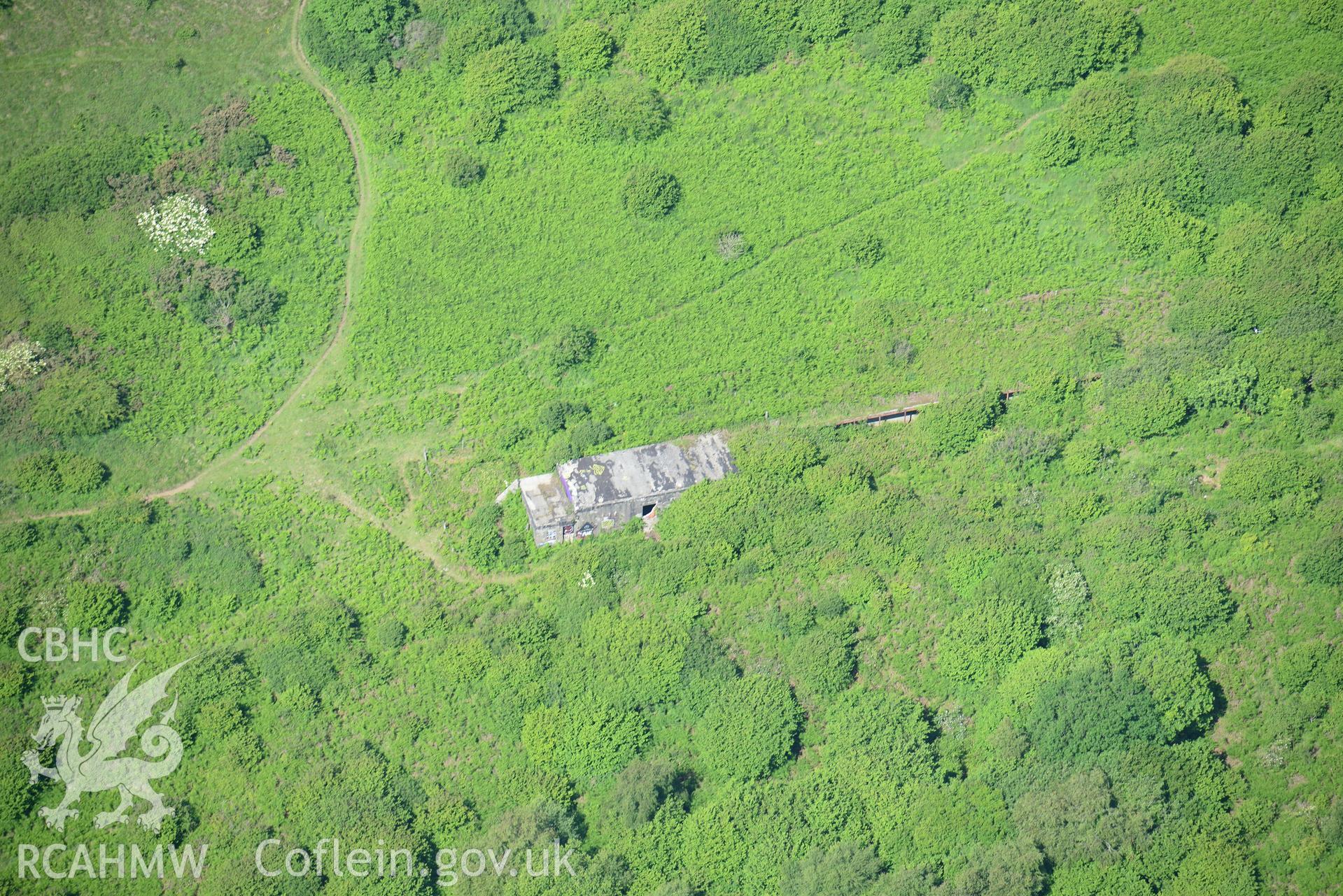 Merthyr Mawr Warren and a ruined building at Wig Fach Firing Range 2. Oblique aerial photograph taken during the Royal Commission's programme of archaeological aerial reconnaissance by Toby Driver on 19th June 2015.