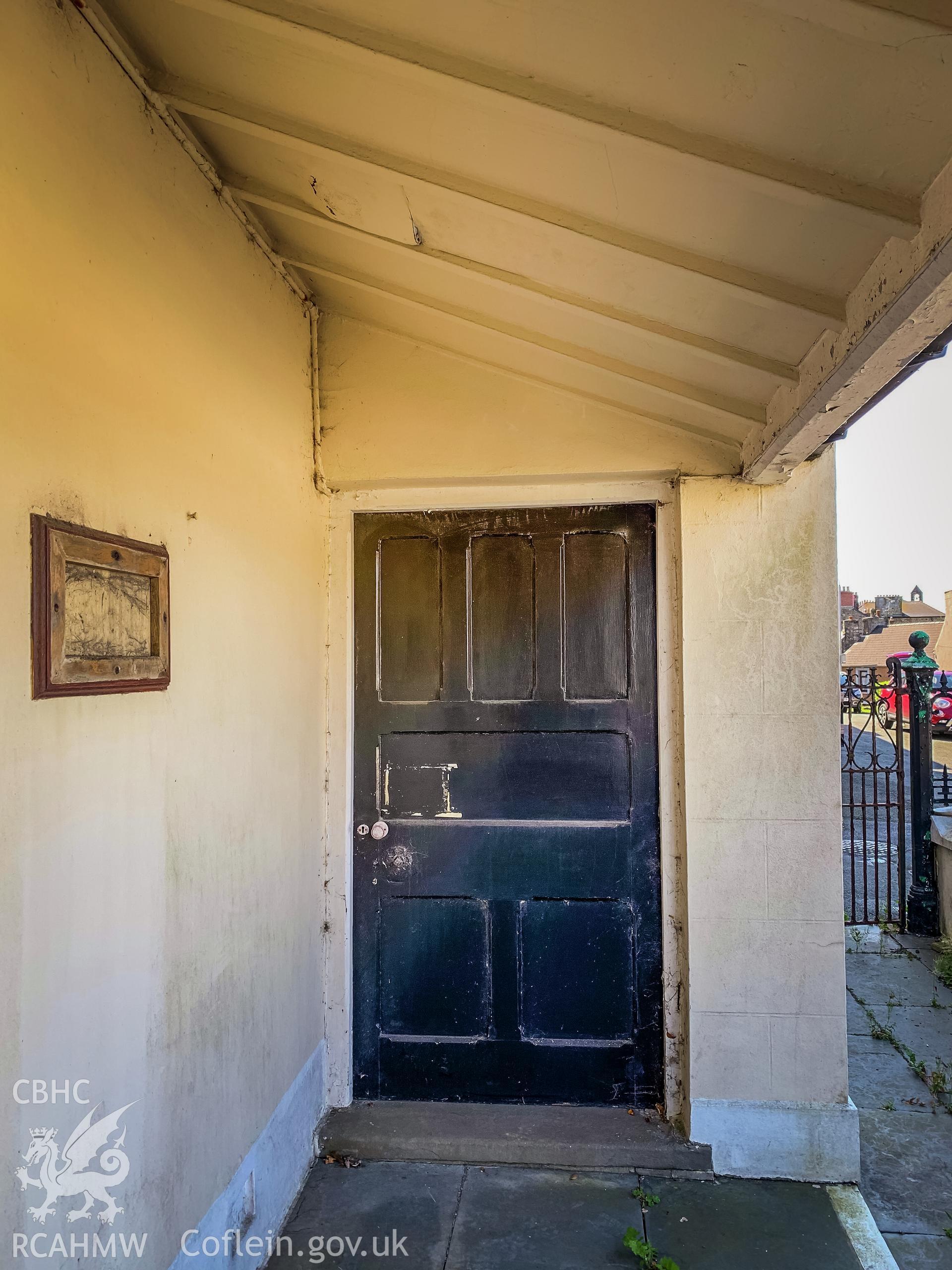 Digital colour photograph showing detailed view of exterior view of door at Pentower Chapel, Fishguard, dated 2019. Photographed by Grace Elliott to meet a condition attached to a planning application.