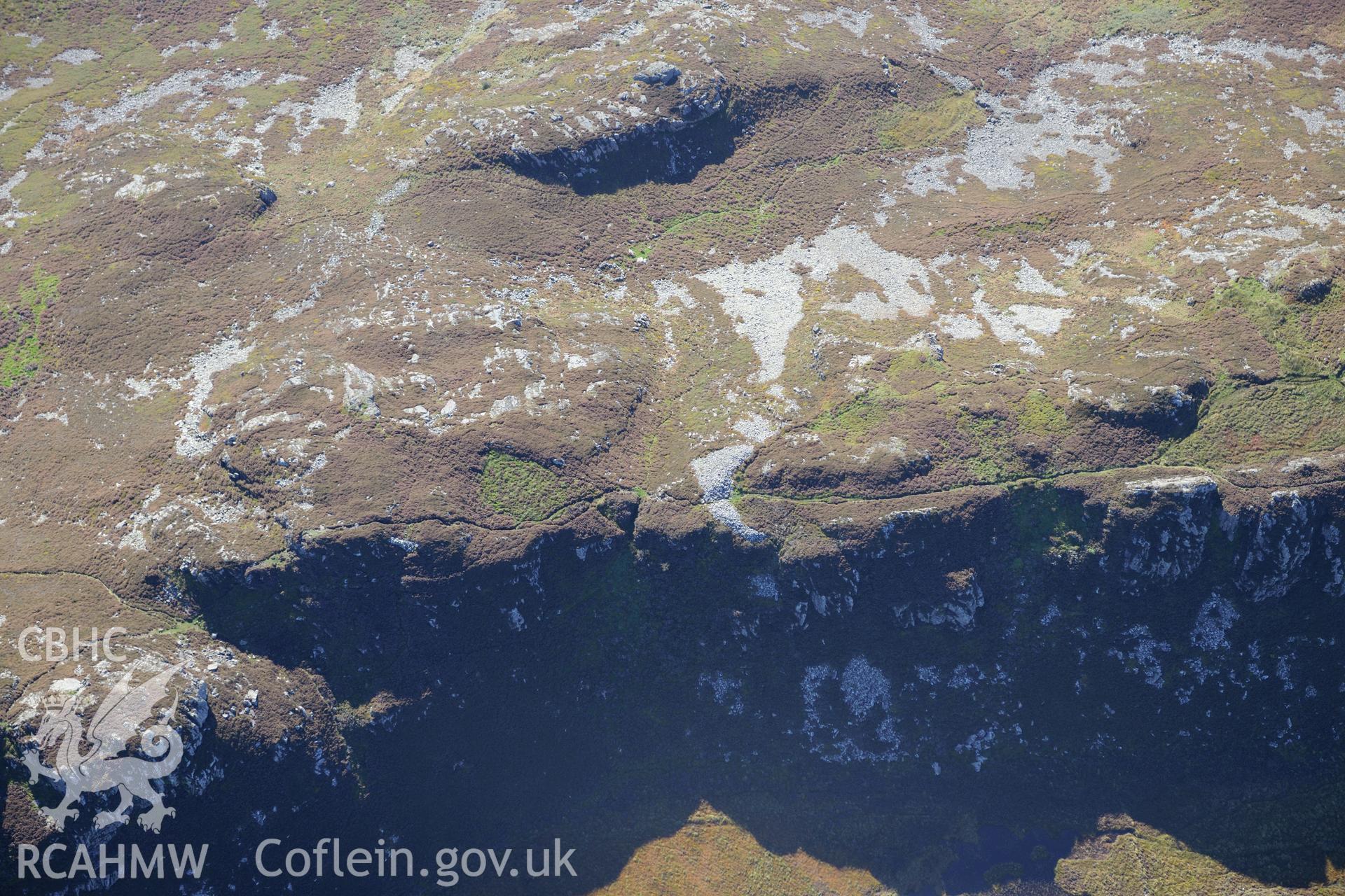 Pared y Cefnhir hillfort, about halfway between Dolgellau and Fairbourne. Oblique aerial photograph taken during the Royal Commission's programme of archaeological aerial reconnaissance by Toby Driver on 2nd October 2015.