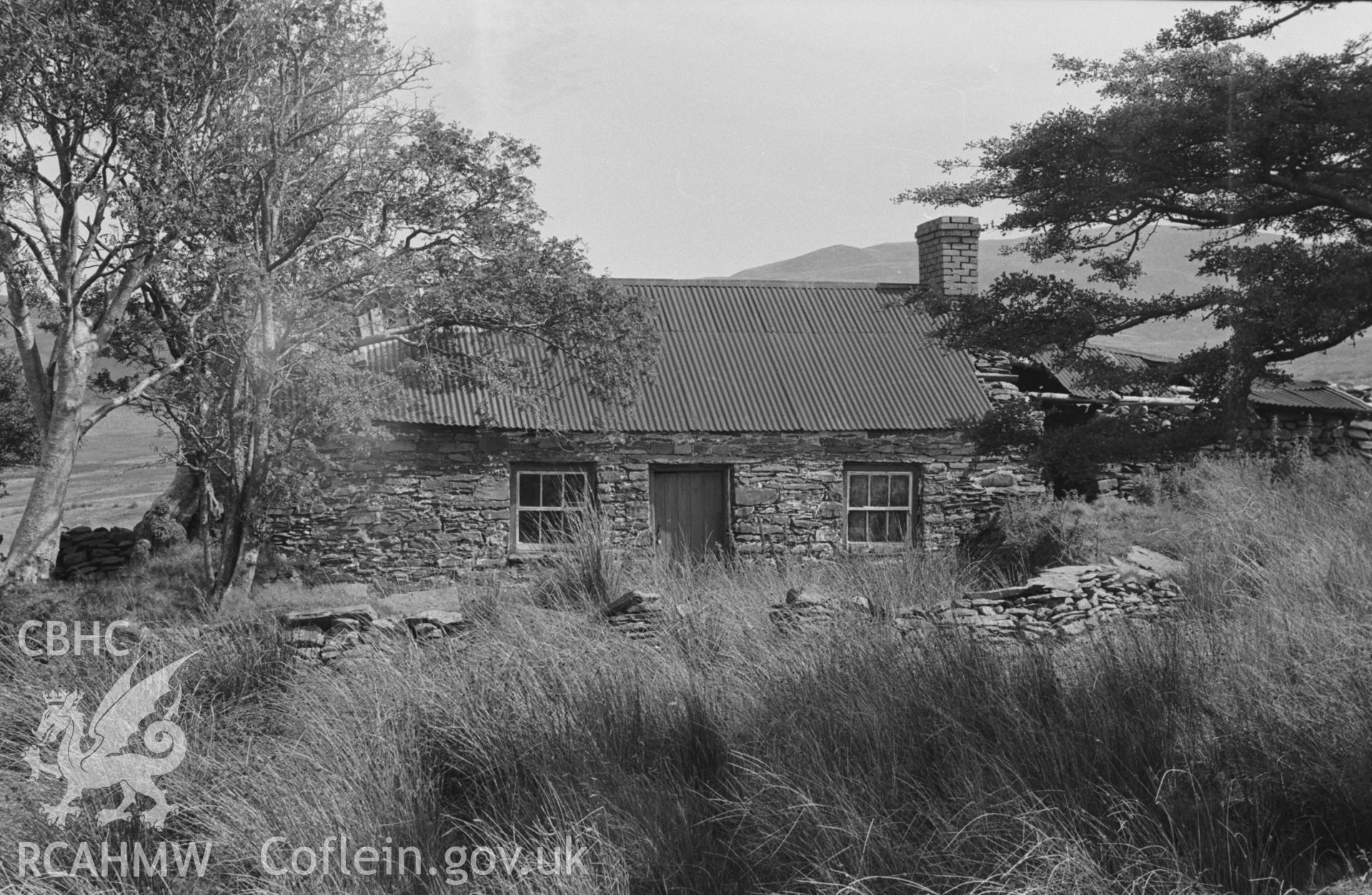 Digital copy of a black and white negative showing view of Ty-Newydd ruin (At 1,050 ft.) near Afon Fflur, Ystrad Fflur, part of the Bryneithinog squatter settlement. Photographed by Arthur O. Chater in August 1967. (Looking north from Grid Reference SN 7331 6314).