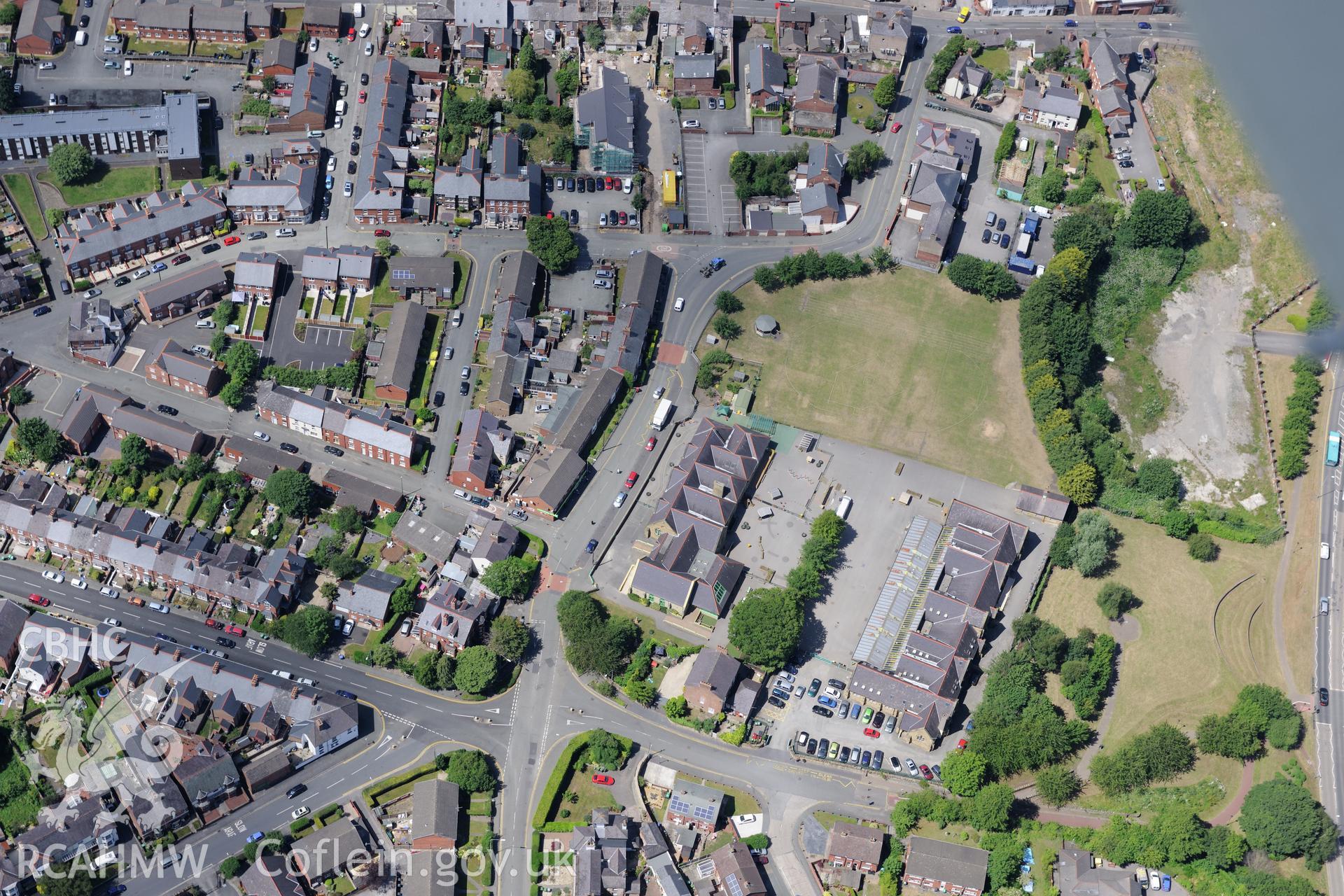View centred around Madeira Hill cottage, Wrexham. Oblique aerial photograph taken during the Royal Commission's programme of archaeological aerial reconnaissance by Toby Driver on 30th June 2015.