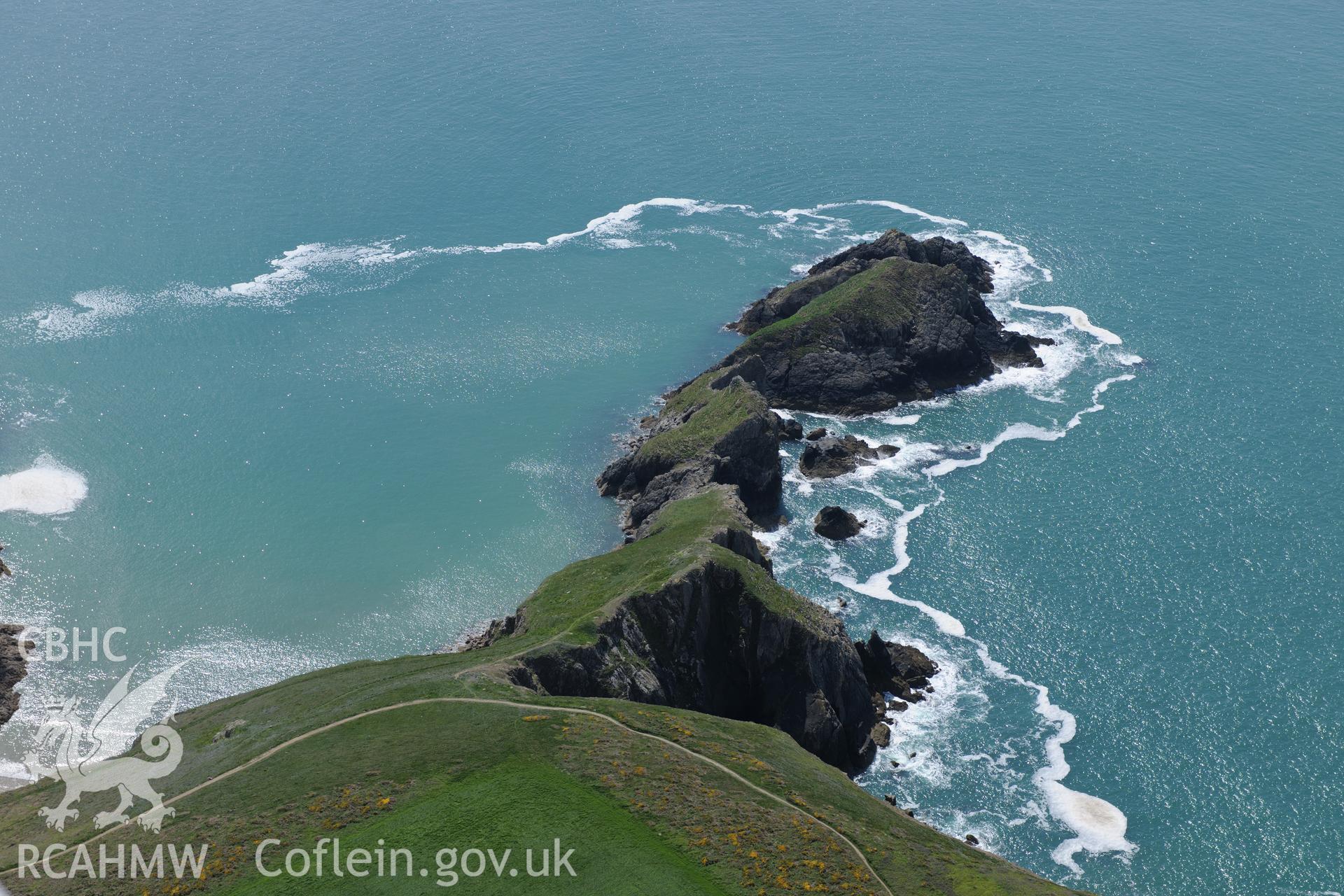 Dinas Fach defended enclosure, Solva. Oblique aerial photograph taken during the Royal Commission's programme of archaeological aerial reconnaissance by Toby Driver on 13th May 2015.