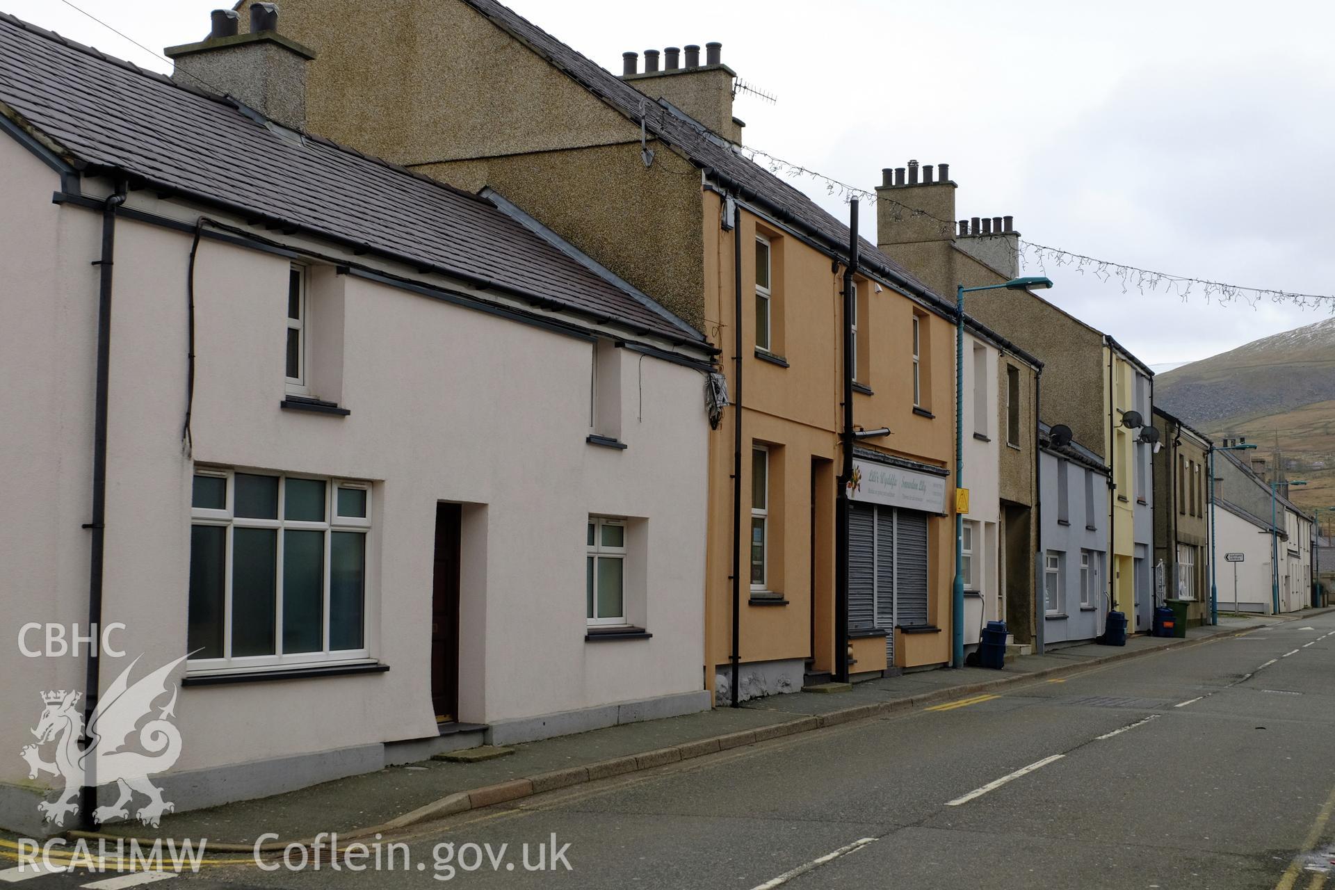 Colour photograph showing view looking east at Stryd Fawr (north side), Deiniolen, produced by Richard Hayman 2nd March 2017