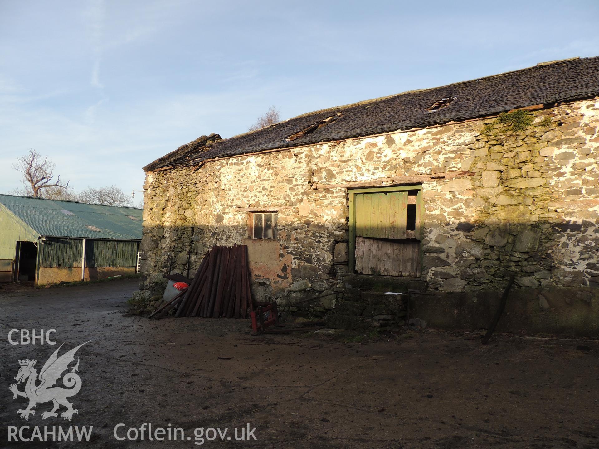 Detailed view of front elevation, looking north west. Photograph taken as part of archaeological building survey conducted at Bryn Gwylan Threshing Barn, Llangernyw, Conwy, carried out by Archaeology Wales, 2017-2018. Report no. 1640. Project no. 2578.