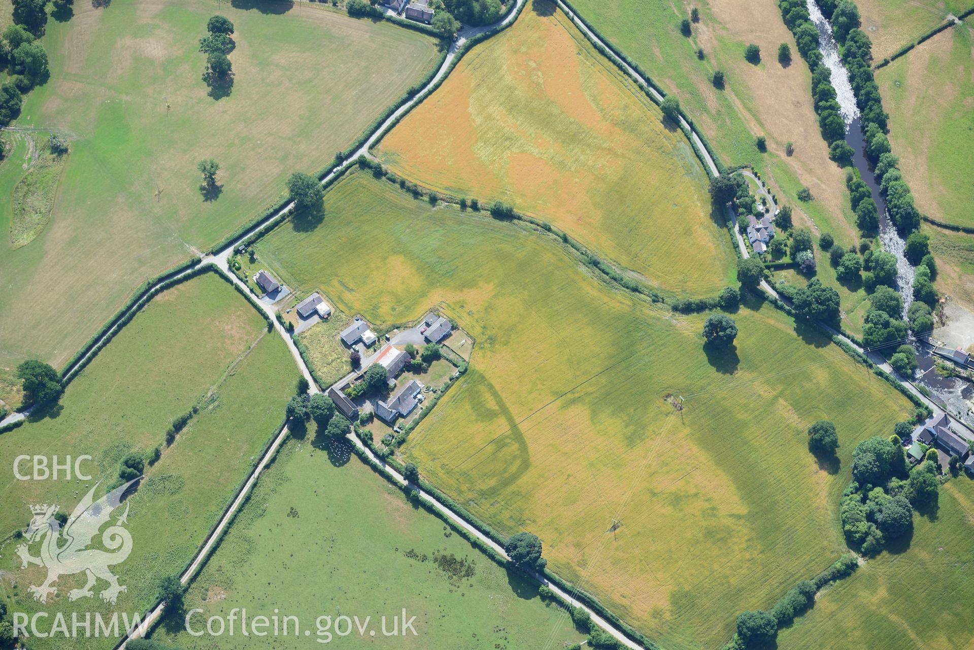 Royal Commission aerial photography of Plas Adda defended enclosure cropmarks taken on 19th July 2018 during the 2018 drought.