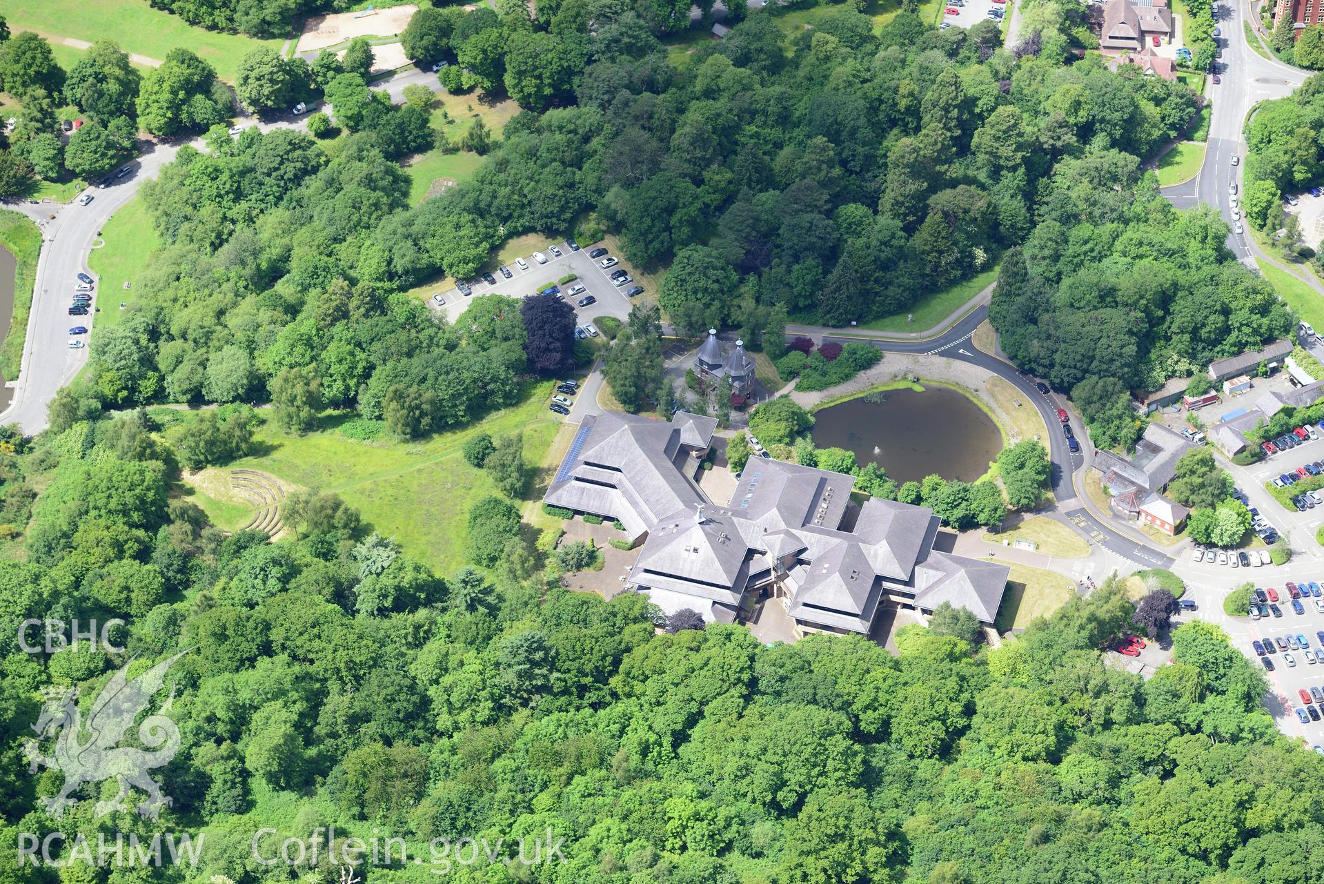 Powys County Hall, Lake Cottage and the site of Pump House and Pump House Hotel, Llandrindod Wells. Oblique aerial photograph taken during the Royal Commission's programme of archaeological aerial reconnaissance by Toby Driver on 30th June 2015.