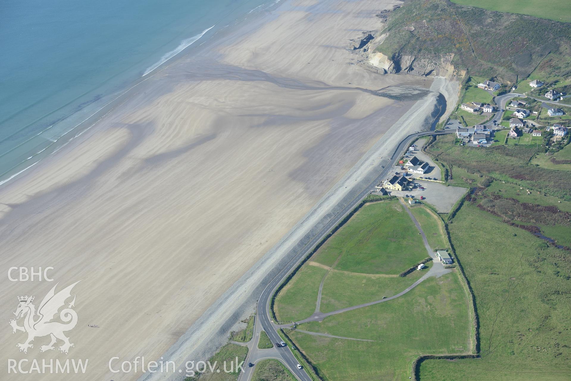 Newgale village and Newgale sands, north west of Haverford West. Oblique aerial photograph taken during the Royal Commission's programme of archaeological aerial reconnaissance by Toby Driver on 30th September 2015.