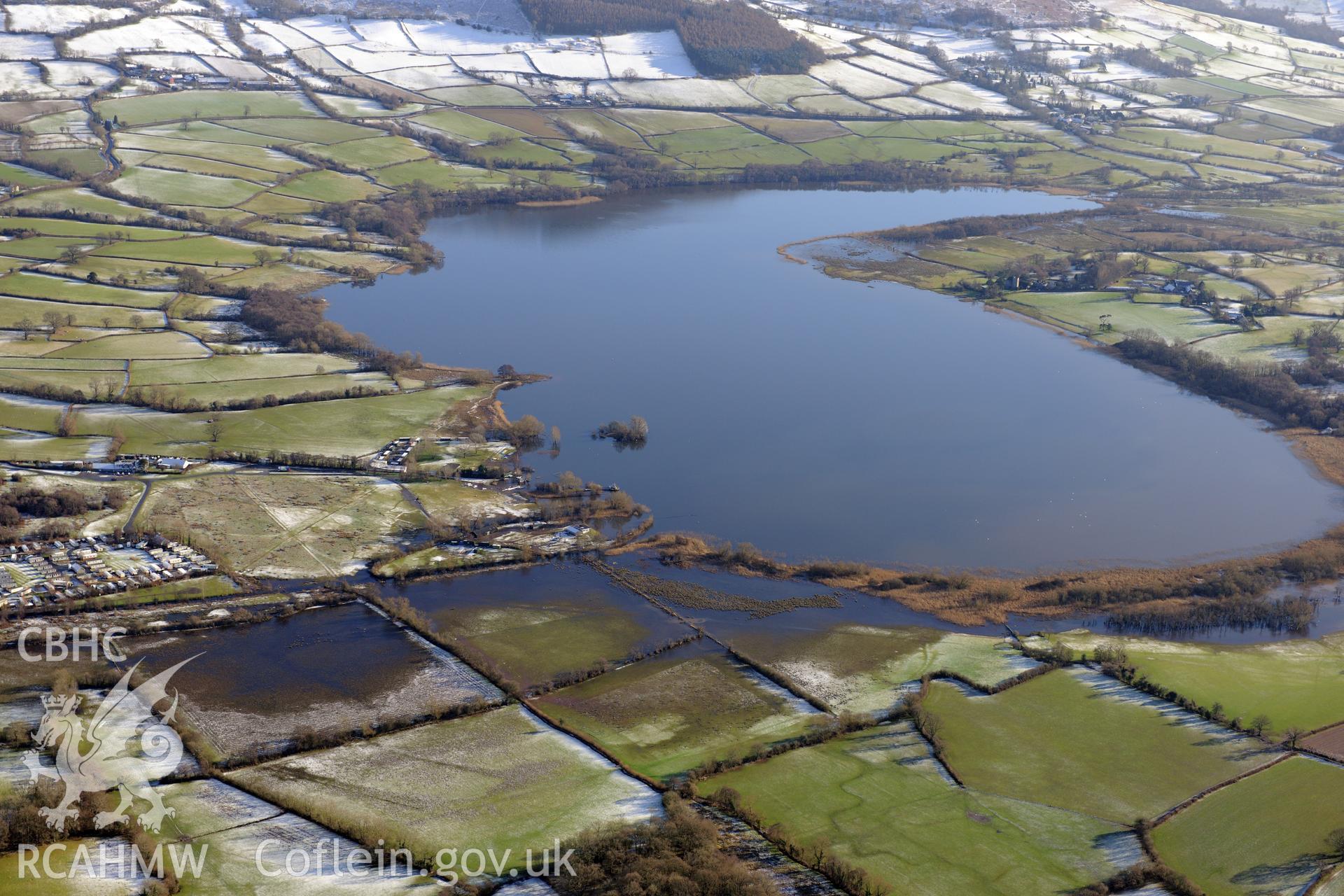 Llangorse lake, south east of Brecon. Oblique aerial photograph taken during the Royal Commission?s programme of archaeological aerial reconnaissance by Toby Driver on 15th January 2013.