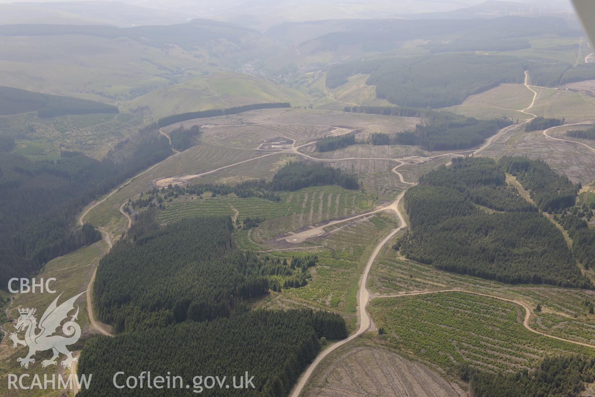 Pen y Cymoedd wind farm under construction before officially opening in September 2017.  Oblique aerial photograph taken during the Royal Commission's programme of archaeological aerial reconnaissance by Toby Driver on 11th June 2015.