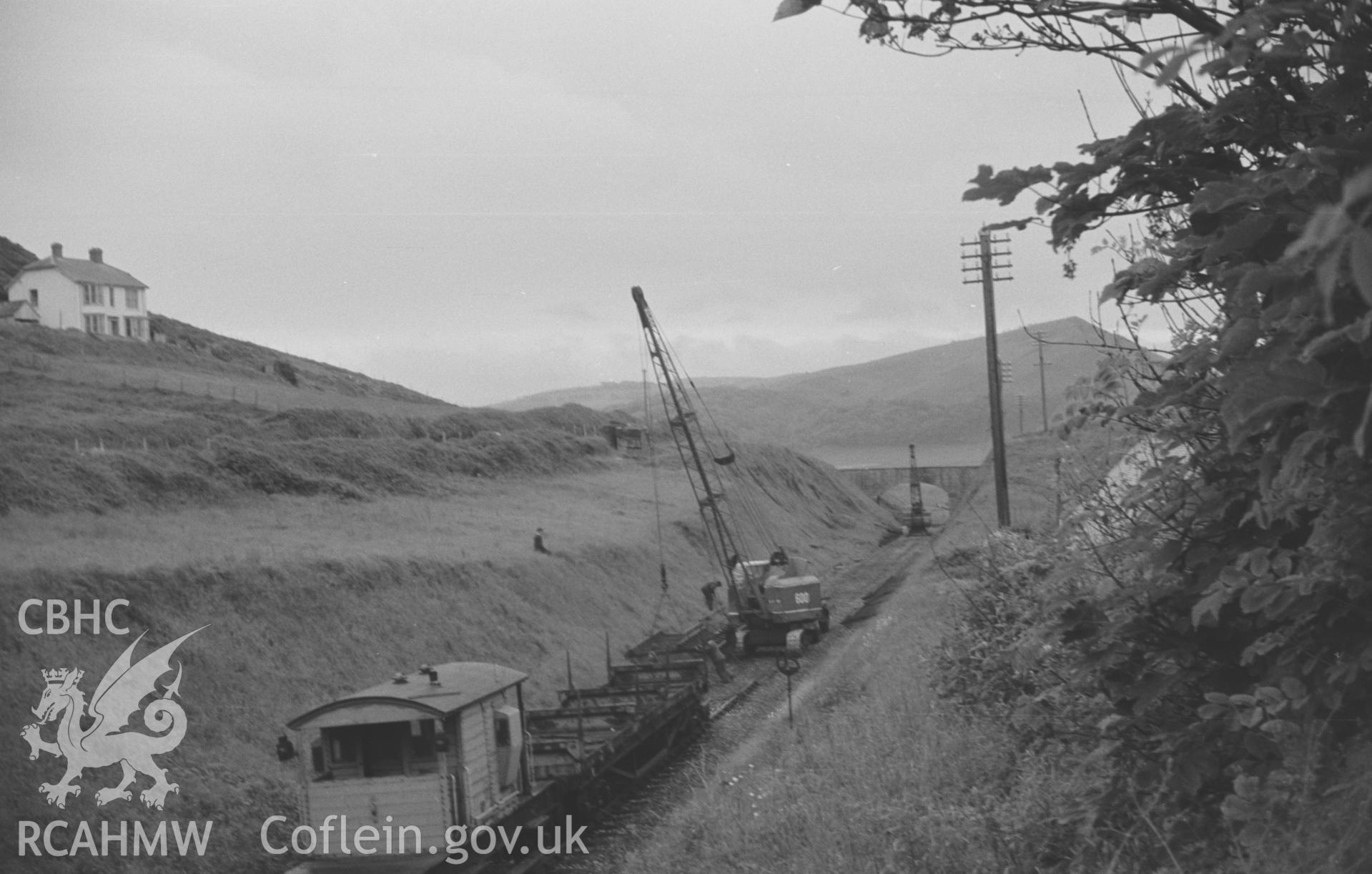 Digital copy of a black and white negative showing the dismantling of the railway at Tanybwlch, near Aberystwyth. Photographed by Arthur O. Chater in June 1966.
