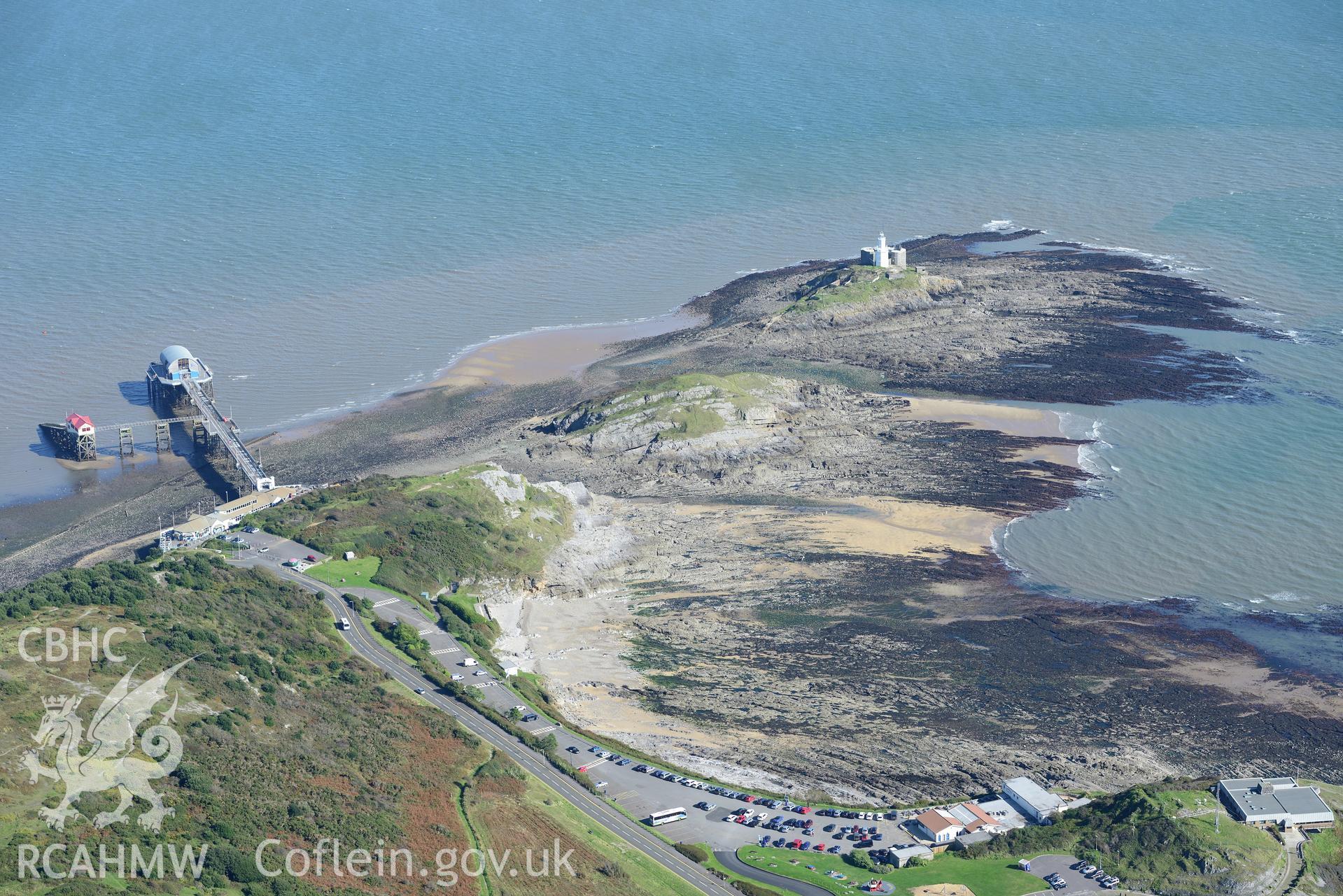 Mumbles fort, pier, coastguard station and lighthouse at the south western edge of Swansea Bay. Oblique aerial photograph taken during the Royal Commission's programme of archaeological aerial reconnaissance by Toby Driver on 30th September 2015.