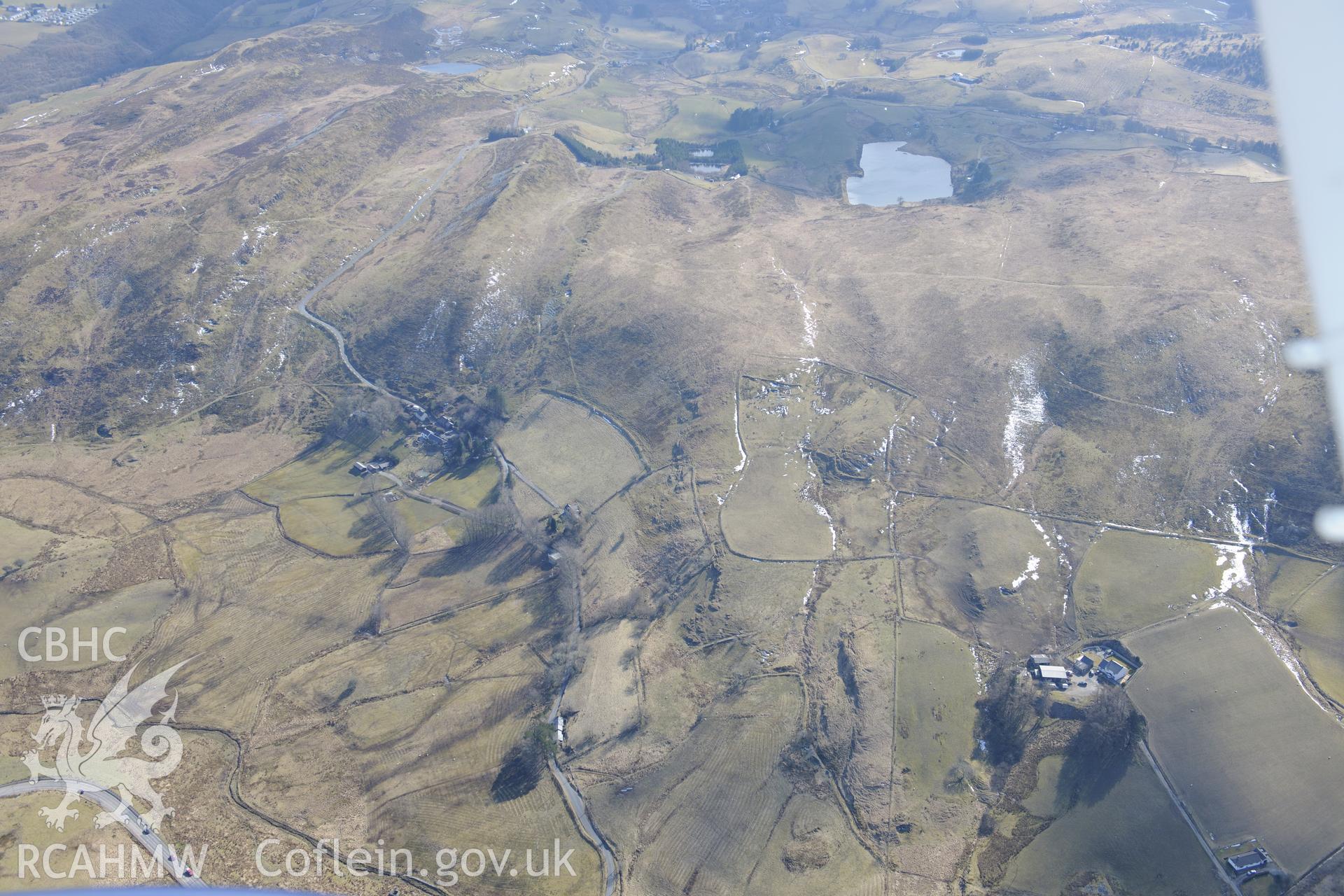 Landscape around Clara United Lead Mine, west of the village of Ponterwyd, near Aberystwyth. Oblique aerial photograph taken during the Royal Commission?s programme of archaeological aerial reconnaissance by Toby Driver on 2nd April 2013.