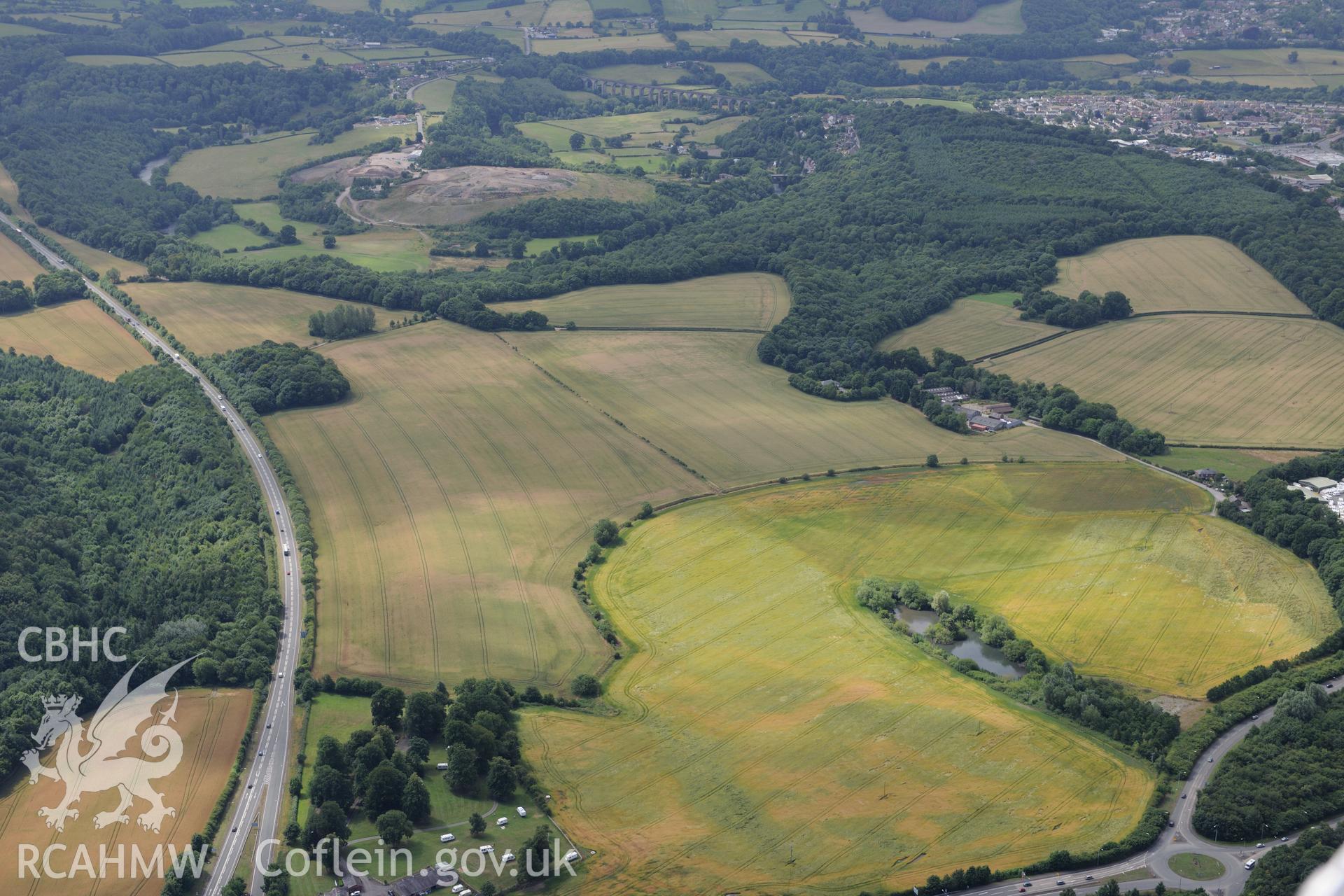 Landscape view showing Cefn Mawr, Cefn Bychan Viaduct and a section of Offa's Dyke north of Home Farm. Oblique aerial photograph taken during the Royal Commission's programme of archaeological aerial reconnaissance by Toby Driver on 30th July 2015.