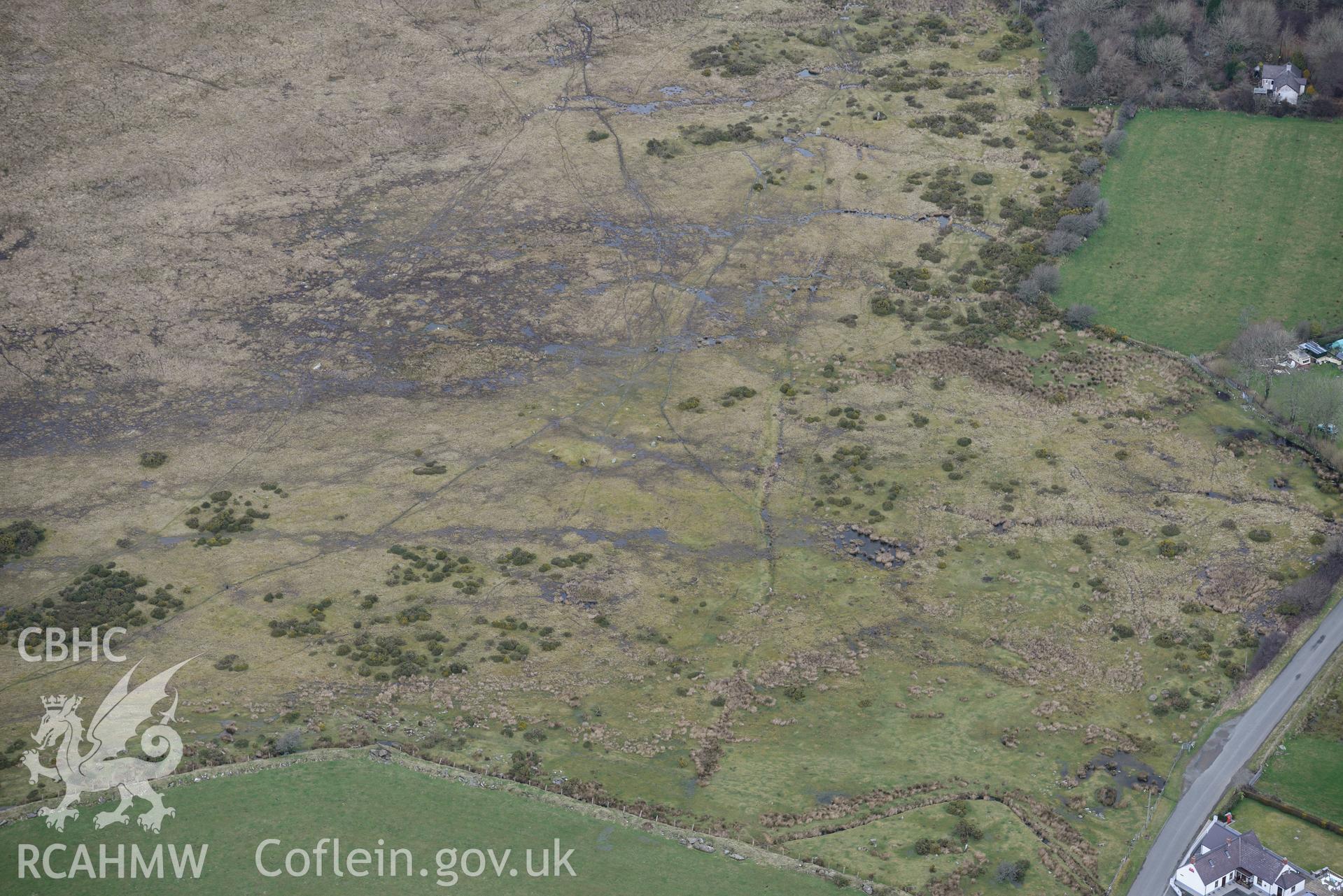 Gors Fawr stone circle, and standing stones, Mynachlog-du near Crymych. Oblique aerial photograph taken during the Royal Commission's programme of archaeological aerial reconnaissance by Toby Driver on 13th March 2015.