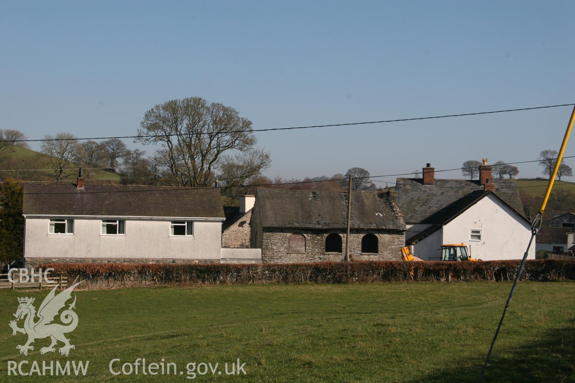 Photograph showing general exterior view of houses and derelict building near Llawrybettws Welsh Calvinistic Methodist chapel, Glanyrafon, Corwen. Produced by Tim Allen on 27th February 2019 to meet a condition attached to planning application.