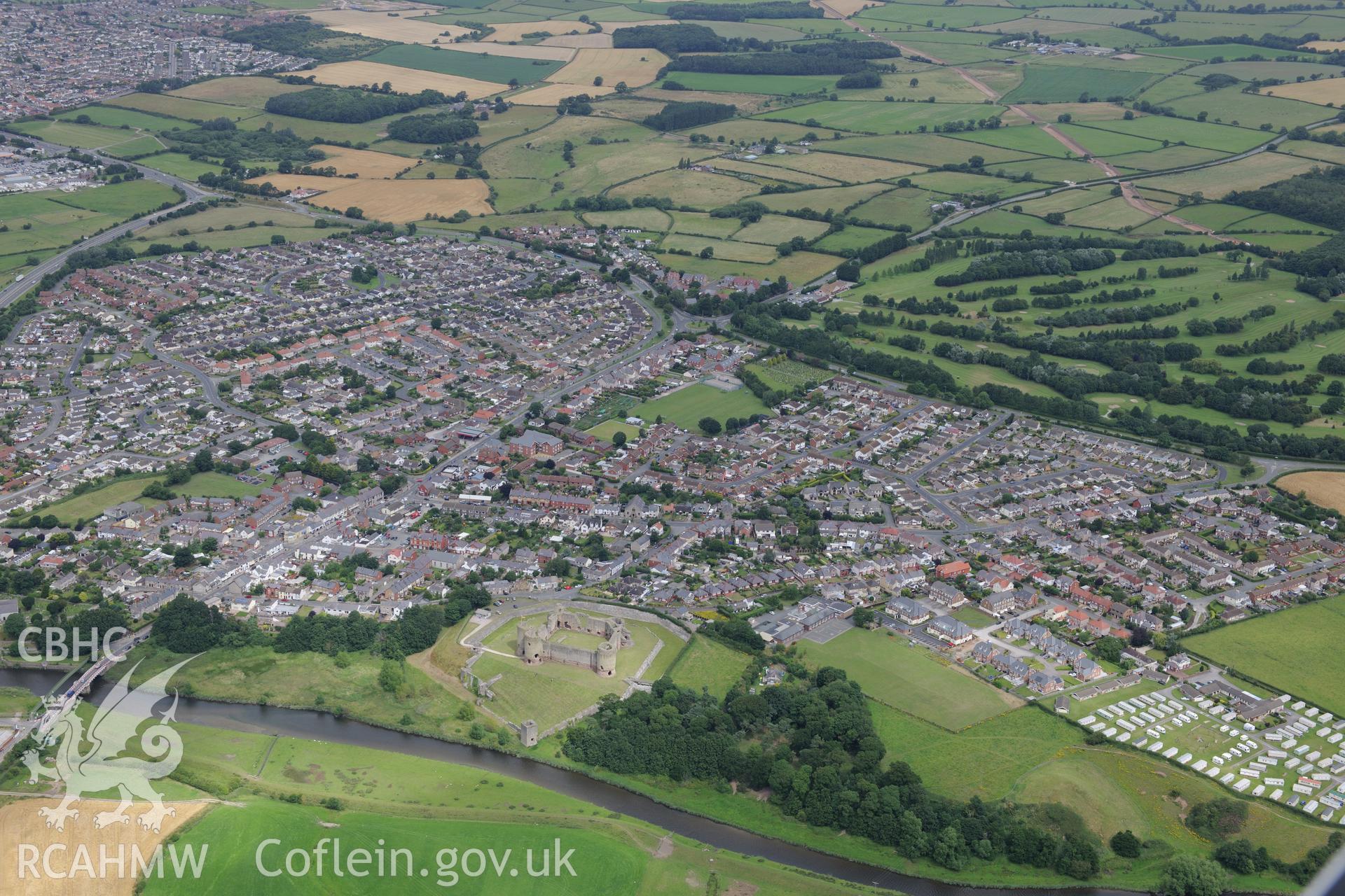 Rhuddlan Castle, Edwardian town defences, bridge, Twt Hill motte and bailey and Norman borough. Oblique aerial photograph taken during the Royal Commission's programme of archaeological aerial reconnaissance by Toby Driver on 30th July 2015.