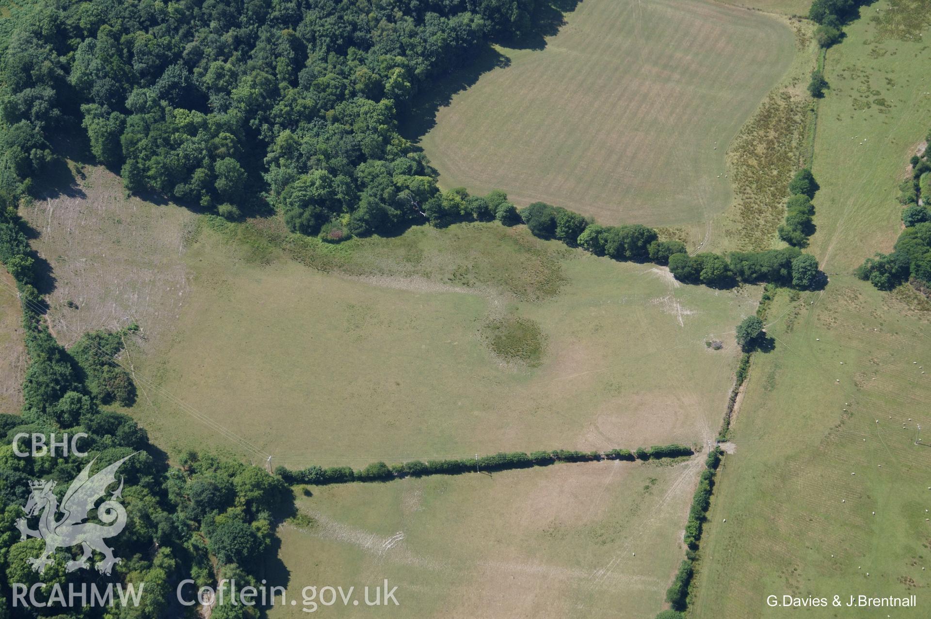 Aerial photograph showing crop mark of a ring with inner markings west of Rhyd-Tir-Isaf, Dyffryn Clarach. Photograph taken by Glyn Davies and Jonathan Brentnall on 22nd July 2018, under drought conditions.