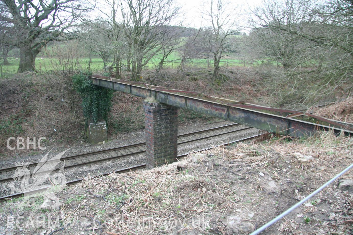'Aqueduct across railway (looking south-southeast).' Digital colour photograph taken during site visit to land south of school lane, Penperlleni. Part of Archaeological Desk Based Assessment conducted by Iestyn Jones of Archaeology Wales, 2014.