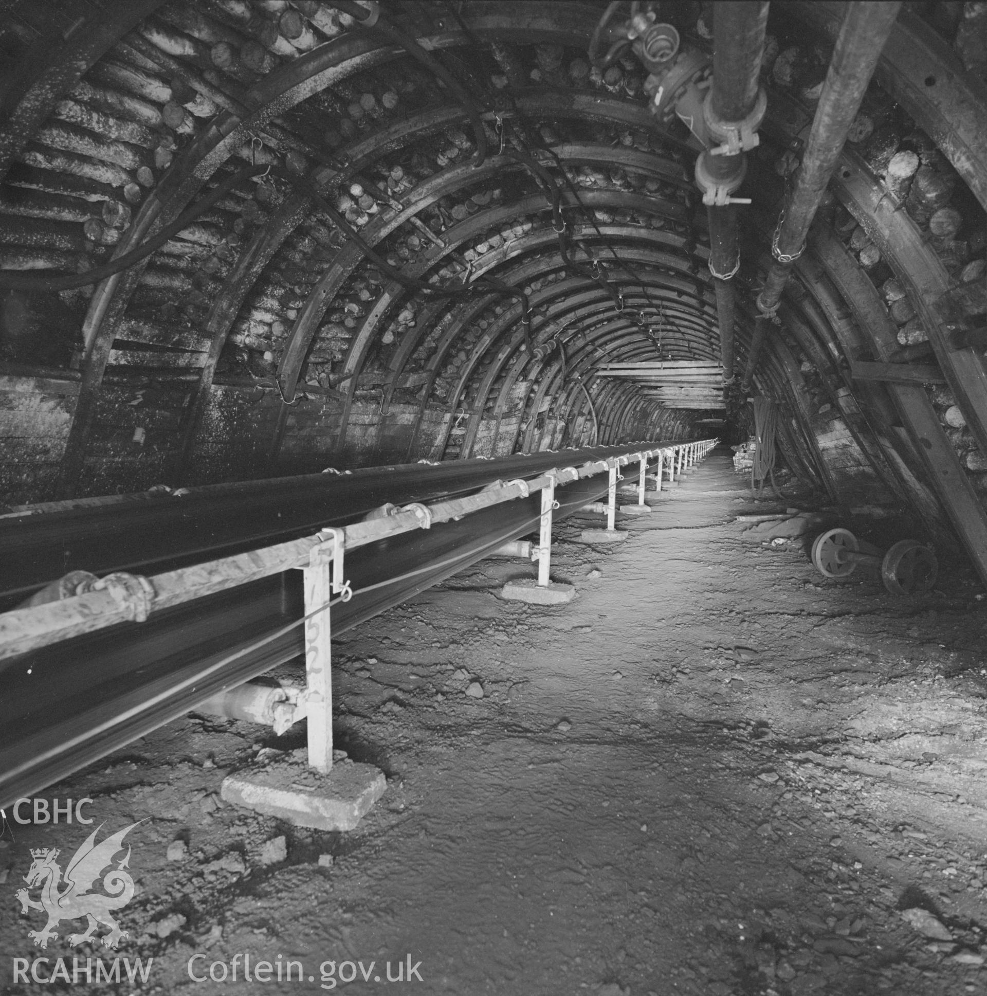 Digital copy of an acetate negative showing main trunk road with conveyor at Marine Colliery from the John Cornwell Collection.