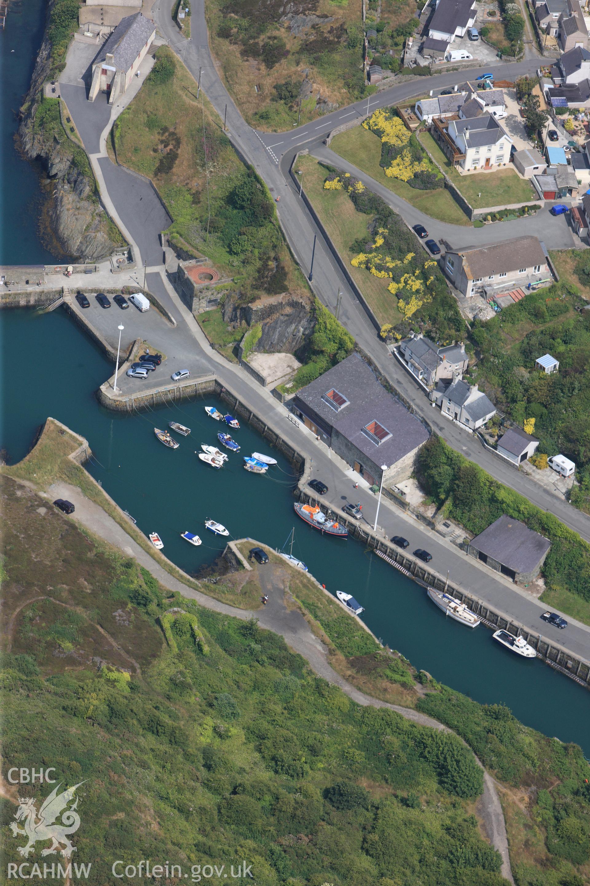 Amlwch harbour, Anglesey. Oblique aerial photograph taken during the Royal Commission?s programme of archaeological aerial reconnaissance by Toby Driver on 12th July 2013.