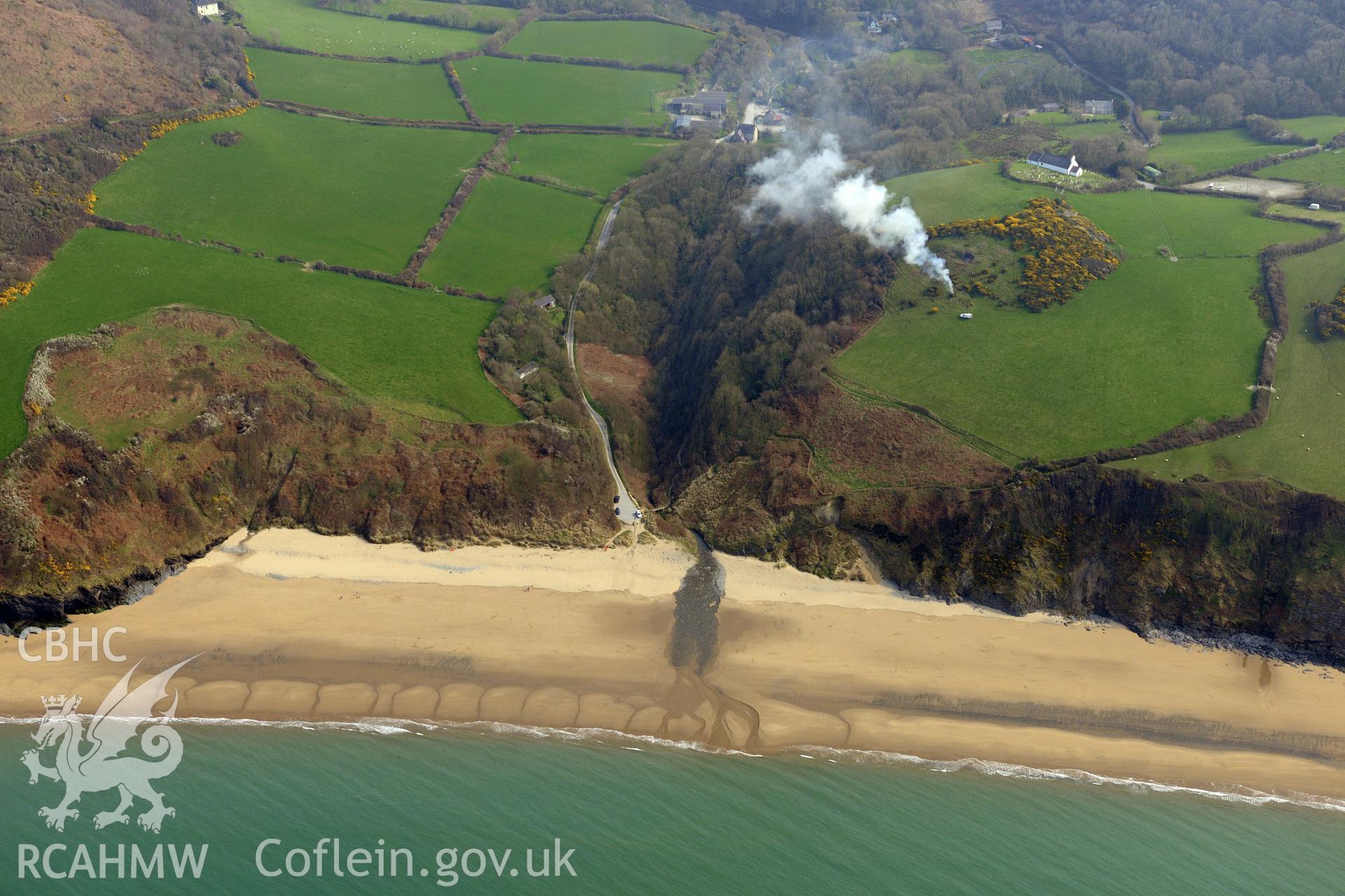 Royal Commission aerial photograph of Penbryn beach taken on 27th March 2017. Baseline aerial reconnaissance survey for the CHERISH Project. ? Crown: CHERISH PROJECT 2017. Produced with EU funds through the Ireland Wales Co-operation Programme 2014-2020. All material made freely available through the Open Government Licence.
