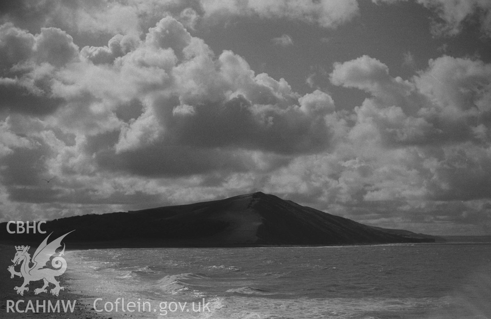 Digital copy of a black and white negative showing view of Alltwen hill from the stone pier at Tanybwlch beach, Aberystwyth. Photographed by Arthur O. Chater in September 1964 from Grid Reference SN 5791 8071, looking south south west.