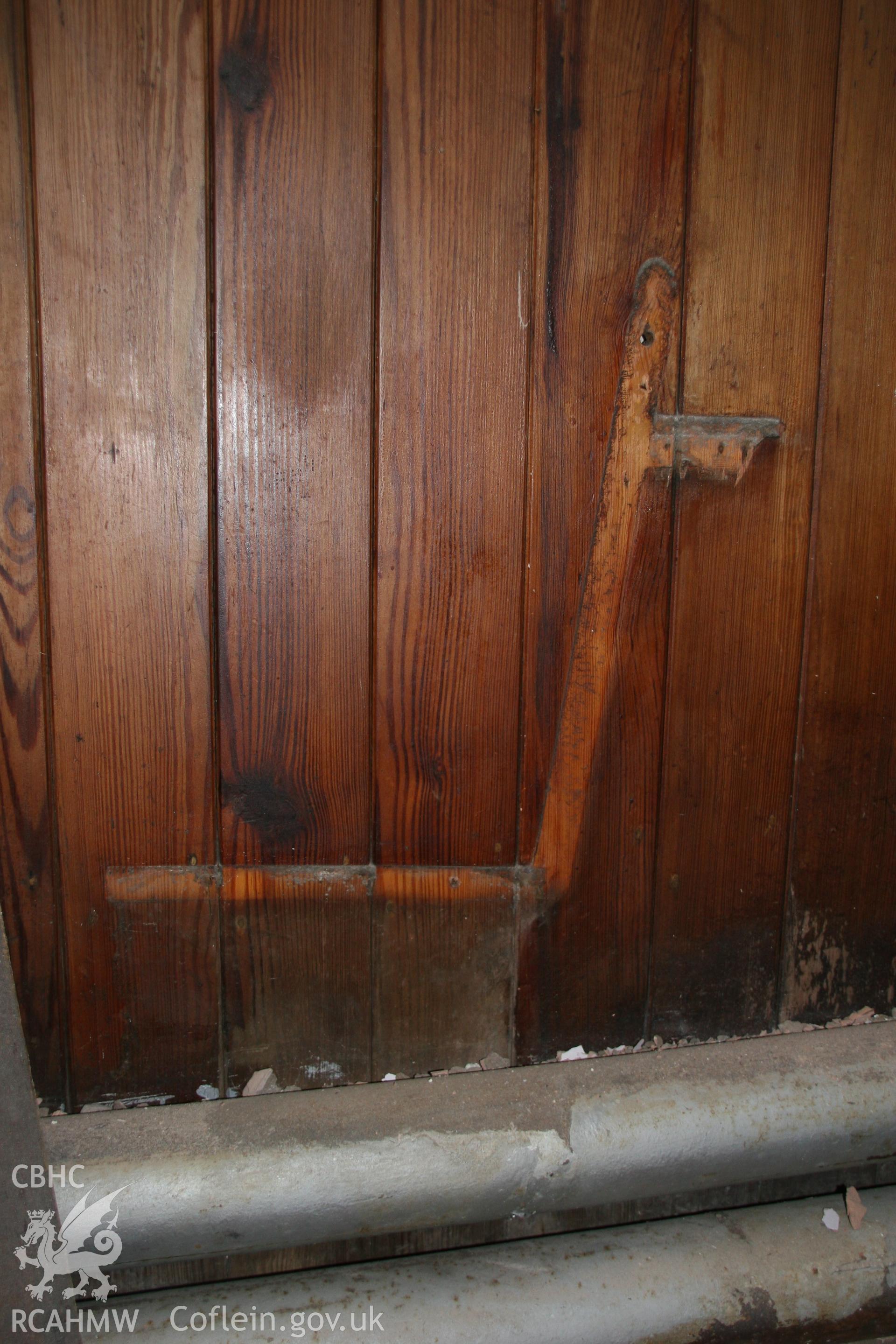 Photograph of vertical dado panelling with pew removed. Outlines to be retained for final restoration of the former Llawrybettws Welsh Calvinistic Methodist chapel. Produced by Tim Allen on 7/03/2019 to meet a condition attached to planning application.