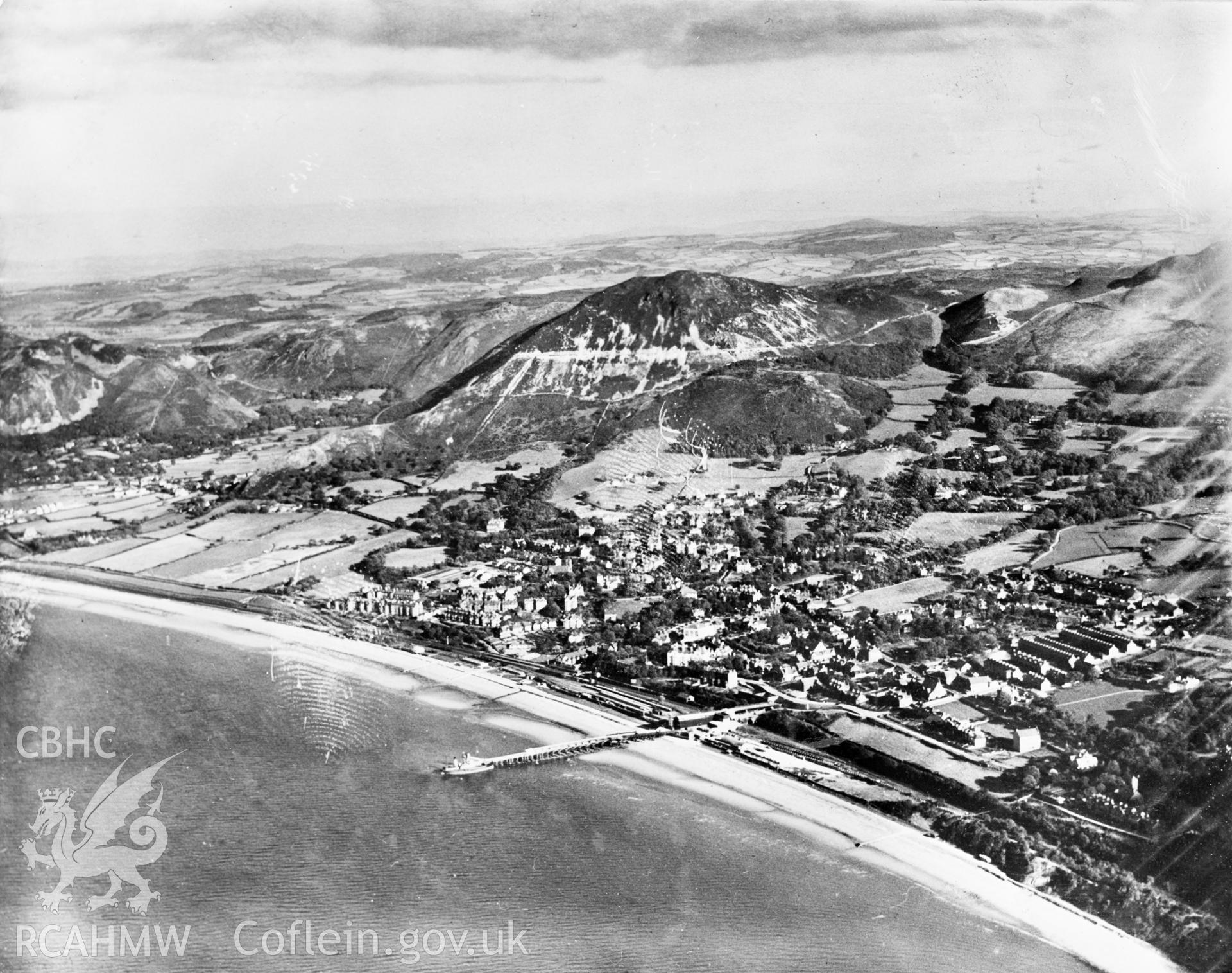 View of Penmaenmawr showing jetty. Oblique aerial photograph, 5?x4? BW glass plate.