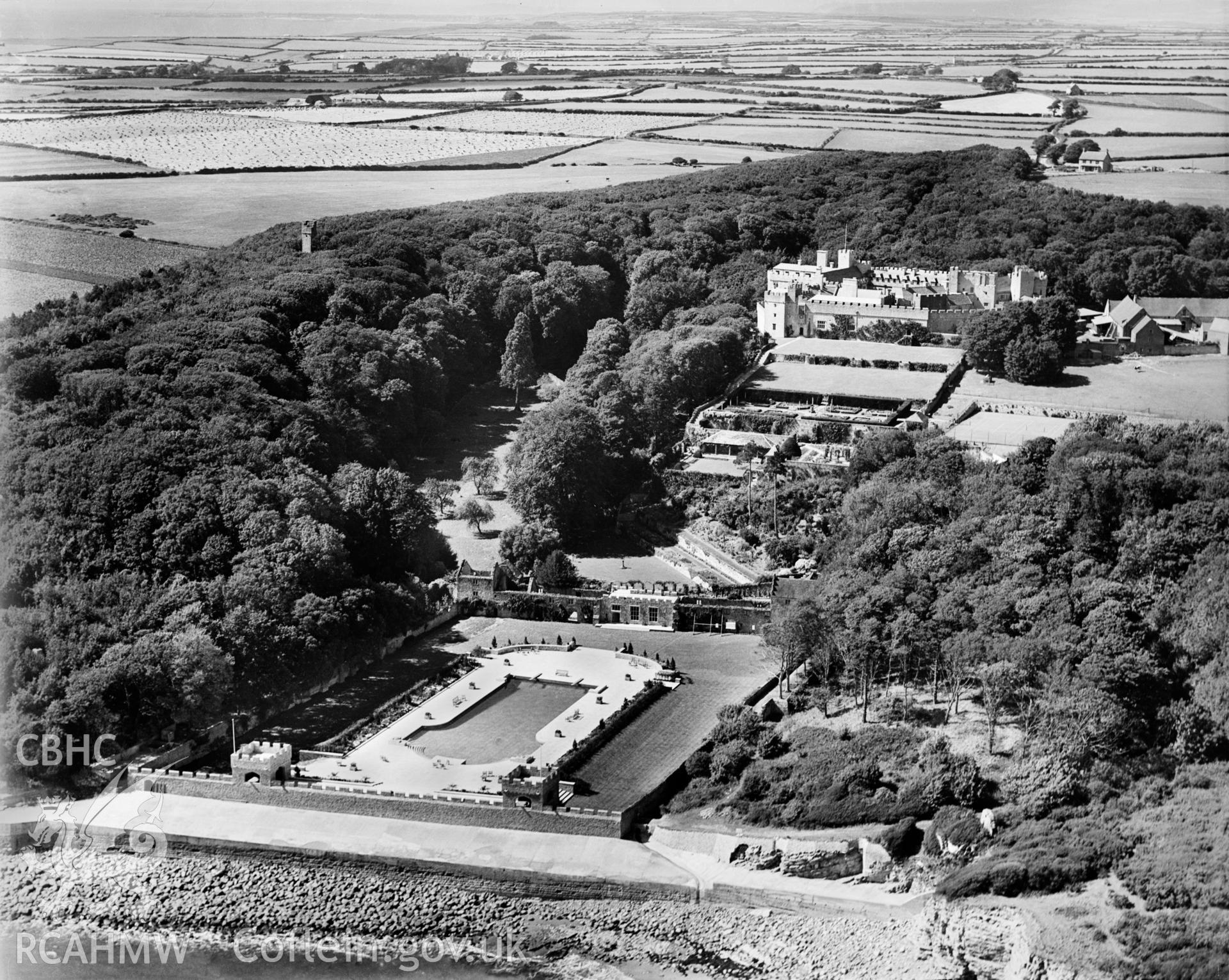 View of St Donats Castle showing castle, grounds and swimming pool, oblique aerial view. 5?x4? black and white glass plate negative.