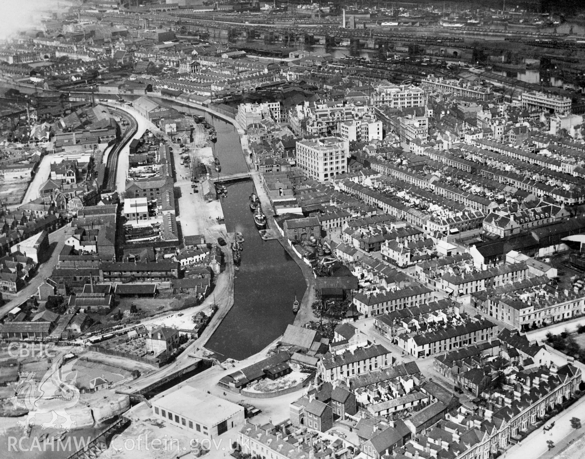 Digital copy of a black and white, oblique aerial photograph of the Glamorganshire Canal. The photograph shows a view of the Sea pound of the Glamorganshire canal in Cardiff, from the South West.