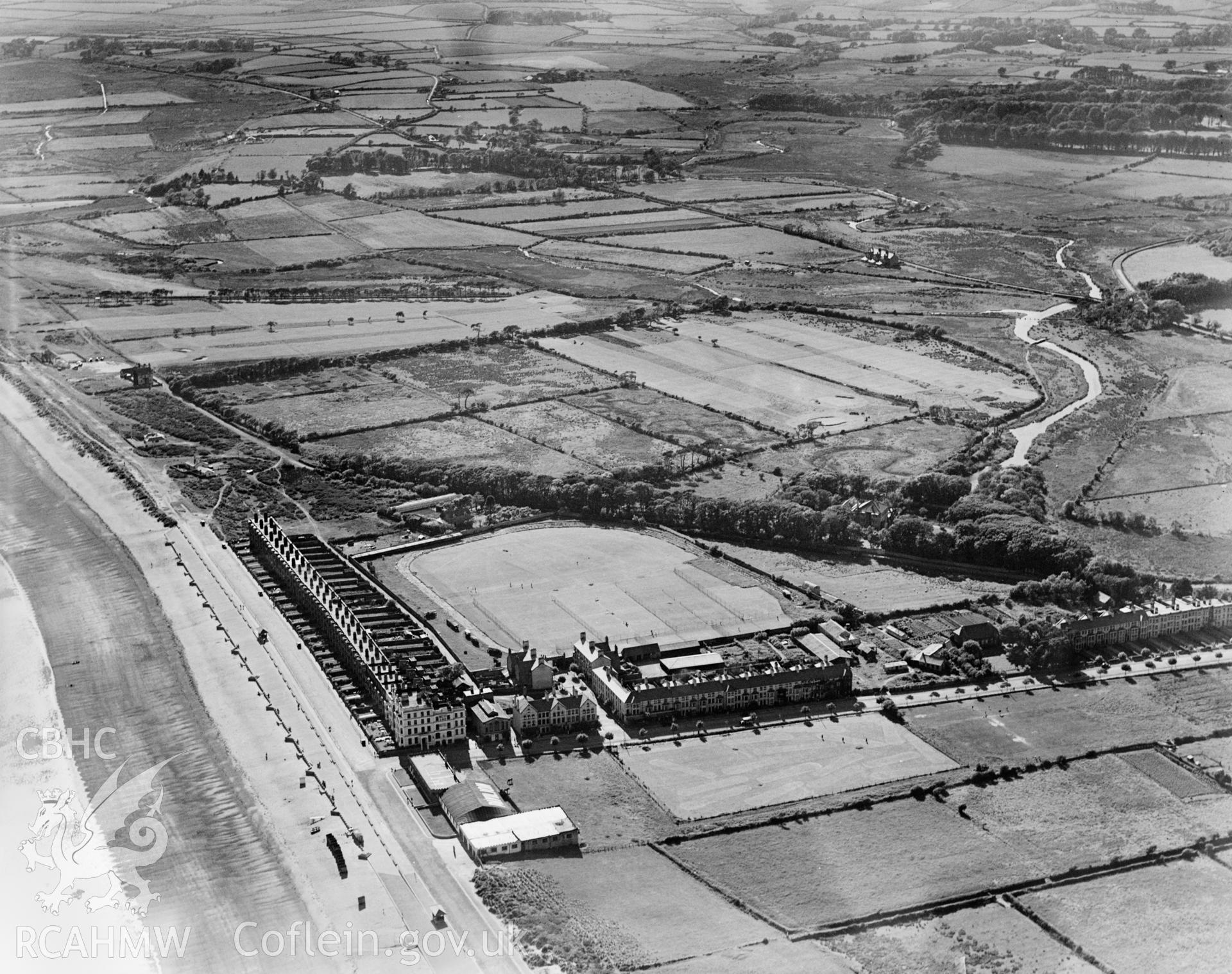 View of Pwllheli showing promenade and recreation ground, oblique aerial view. 5?x4? black and white glass plate negative.