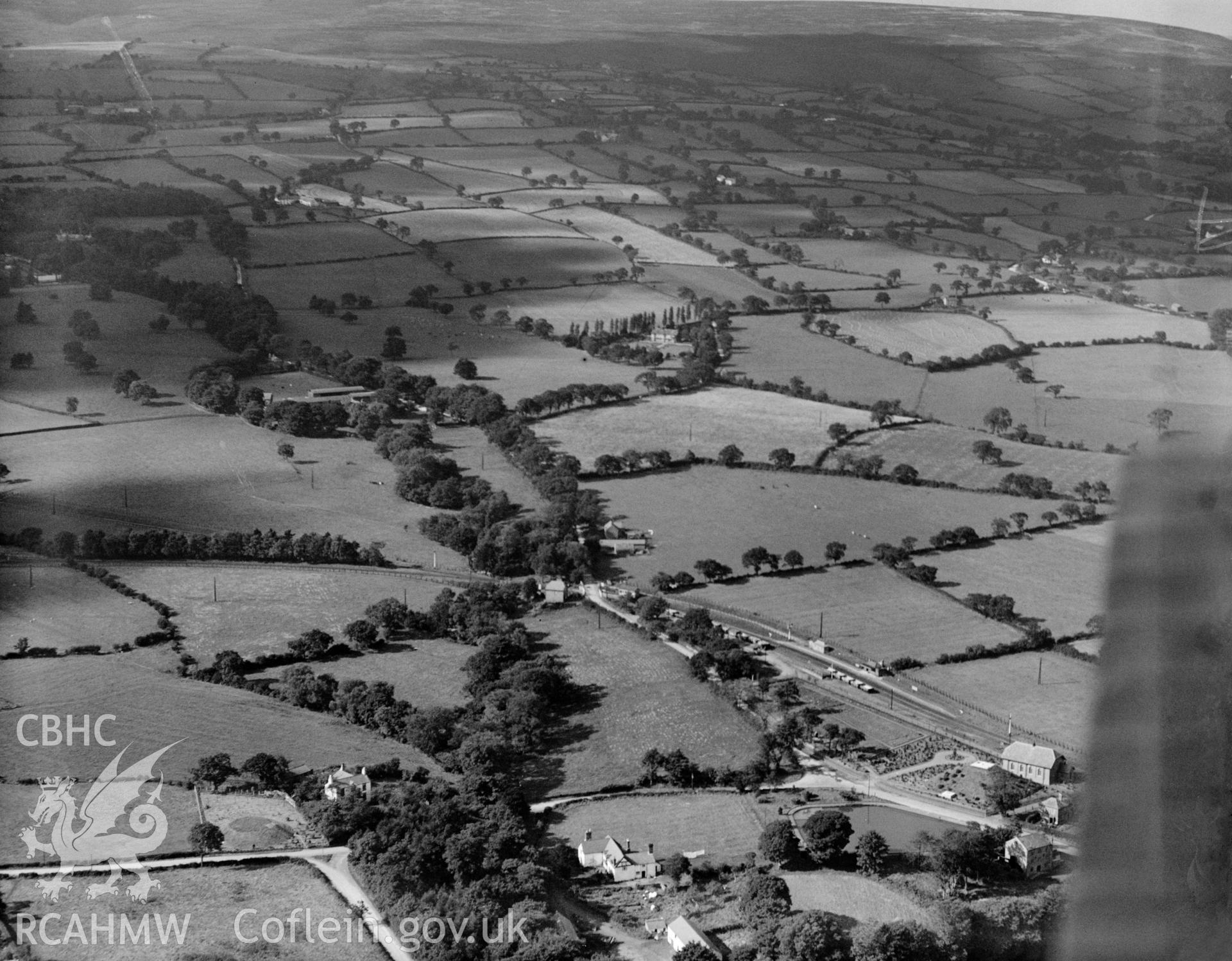 View of Frondeg Hall with Legacy GWR railway in foreground, oblique aerial view. 5?x4? black and white glass plate negative.