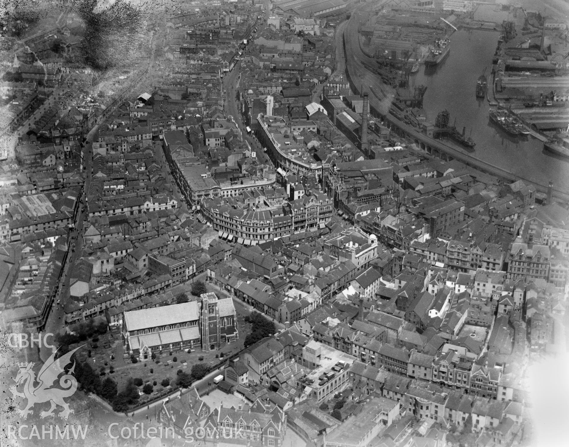 General view of Swansea showing St Mary's church and docks, oblique aerial view. 5?x4? black and white glass plate negative.