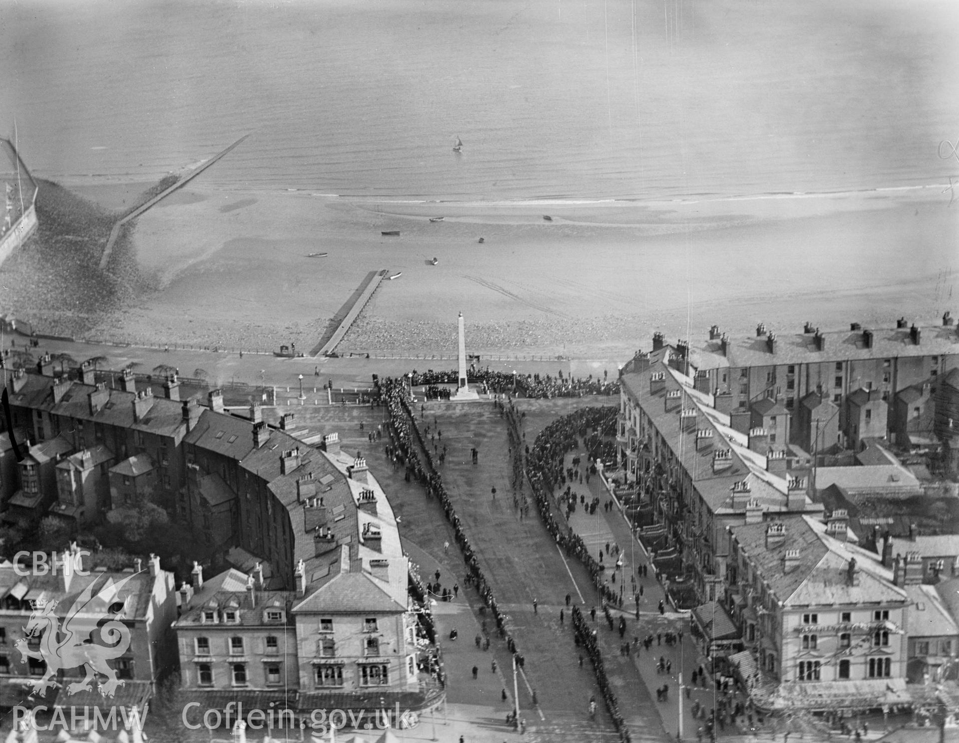 Llandudno, showing the Cenotaph war memorial during ceremony, oblique aerial view. 5?x4? black and white glass plate negative.