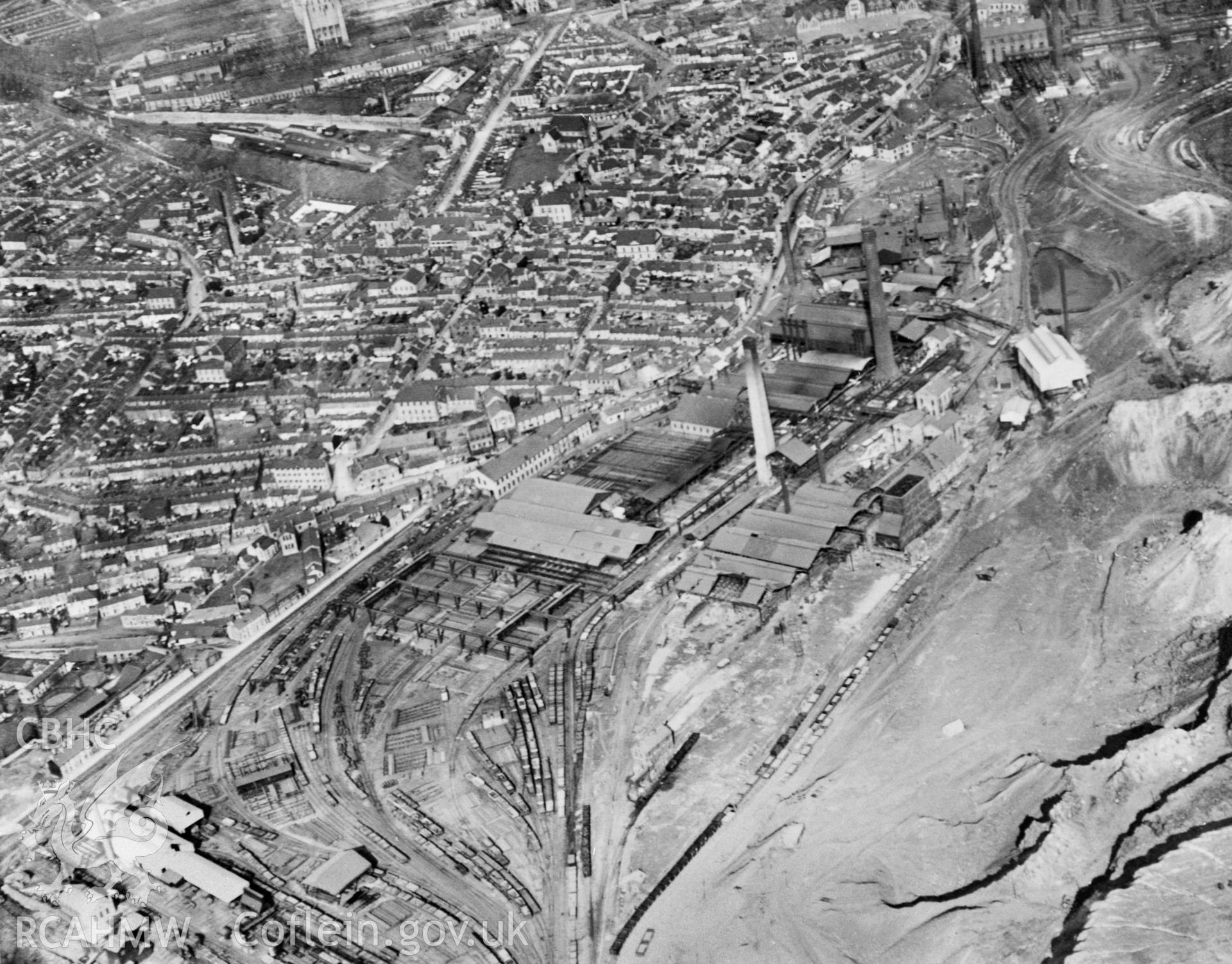 View of Dowlais Ironworks, Merthyr showing the 'Goat Mill'. Oblique aerial photograph, 5?x4? BW glass plate.