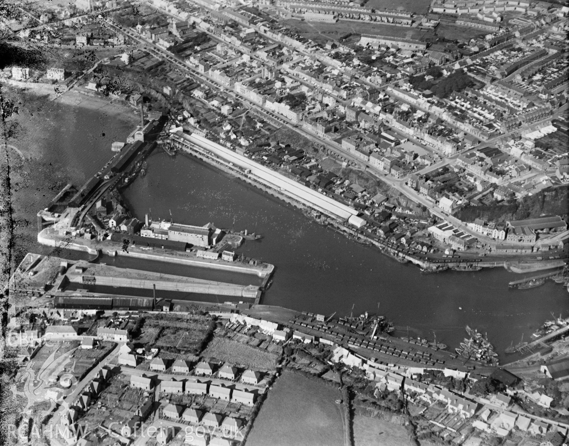 View of Milford Haven and docks, oblique aerial view. 5?x4? black and white glass plate negative.