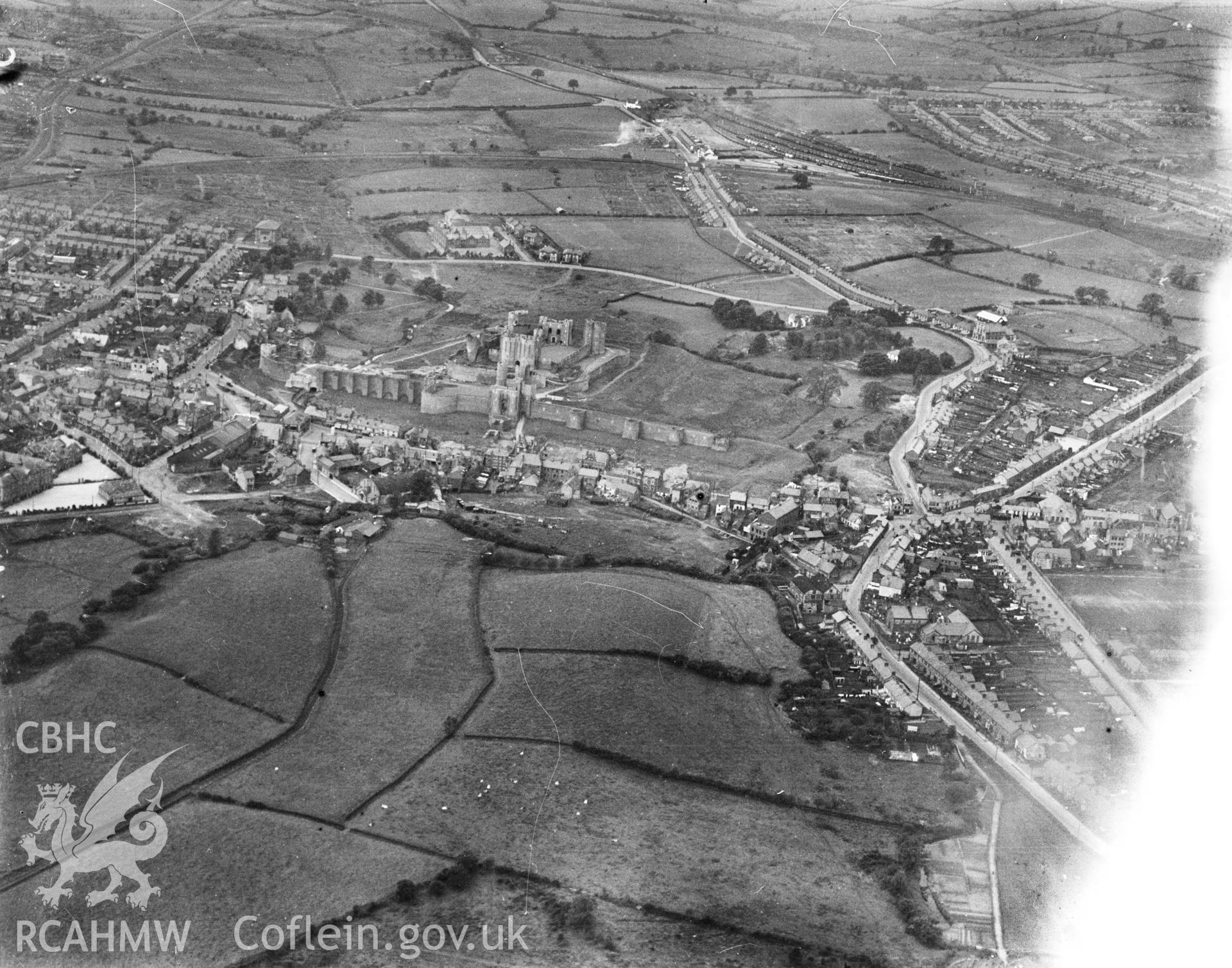 View of Caerphilly showing castle. Oblique aerial photograph, 5?x4? BW glass plate.