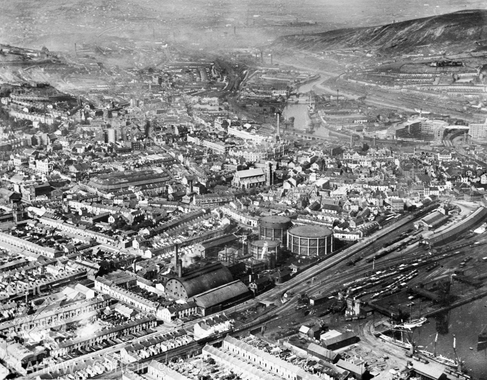View of Swansea showing the gas works, Victoria Station and Weaver and Company's Flour Mills (distant right). Oblique aerial photograph, 5?x4? BW glass plate.