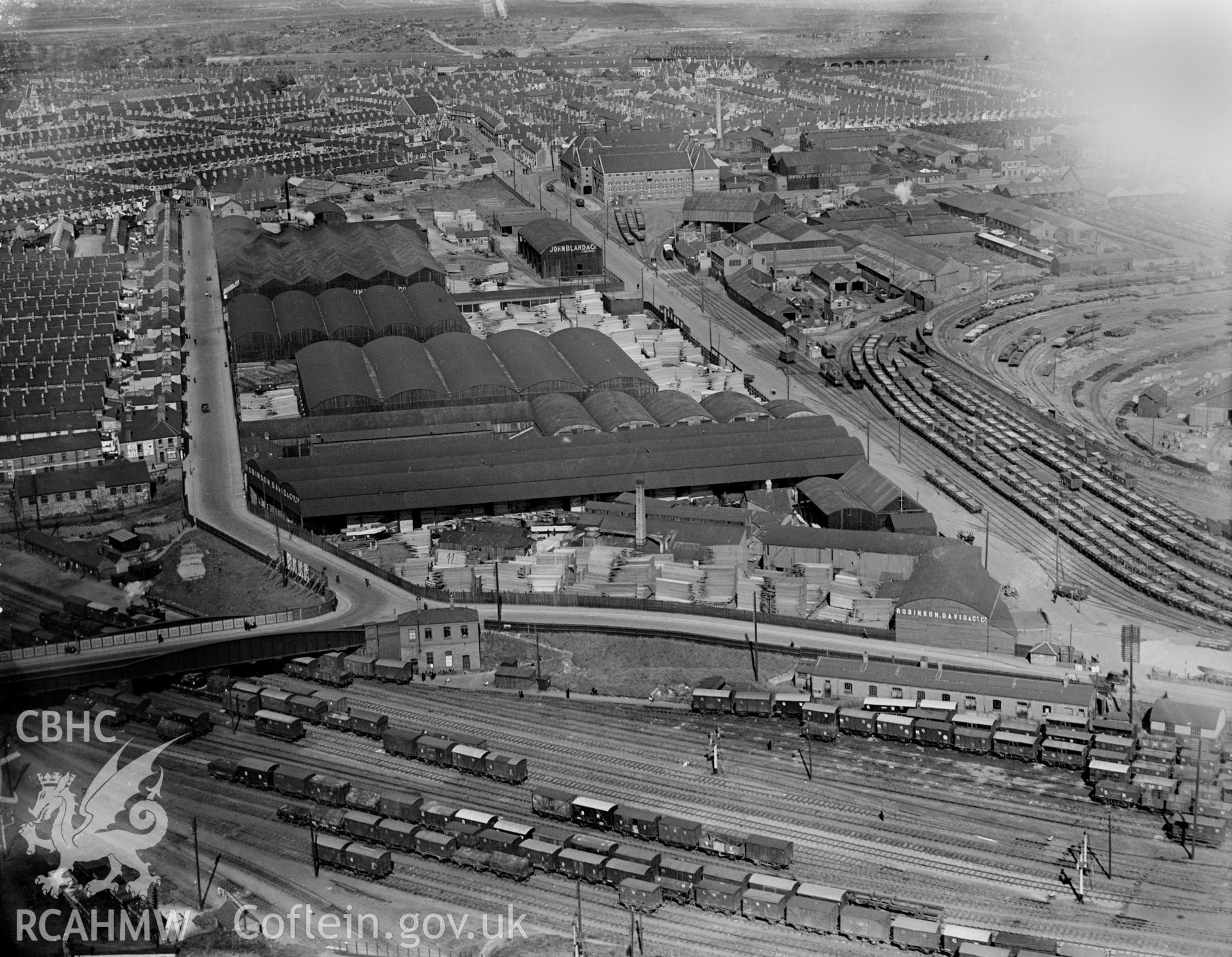 View of Robinson David timber company, Cardiff, oblique aerial view. 5?x4? black and white glass plate negative.