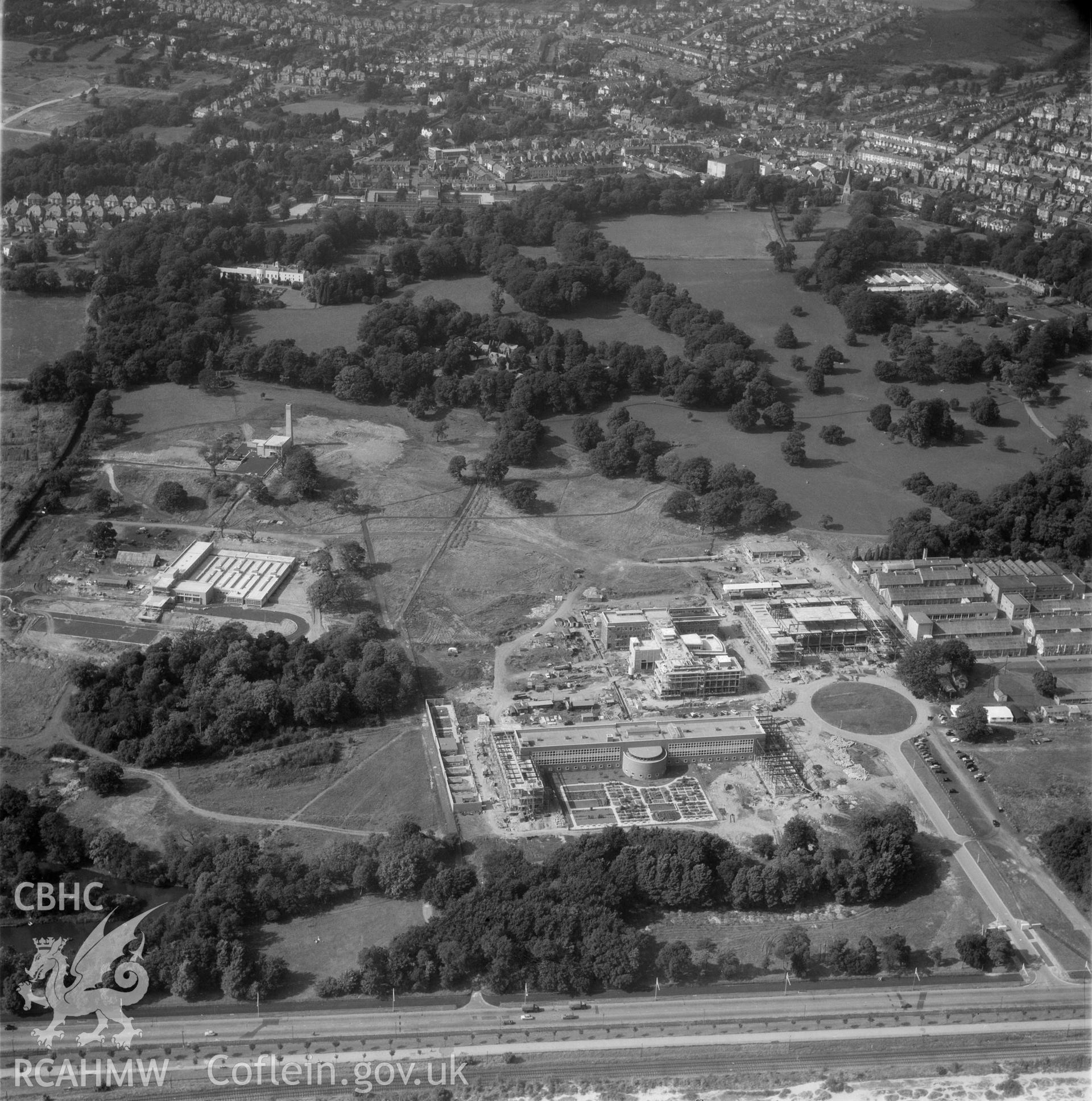 Black and white oblique aerial photograph showing Swansea University, from Aerofilms album Swansea no W30, taken by Aerofilms Ltd and dated 1959.