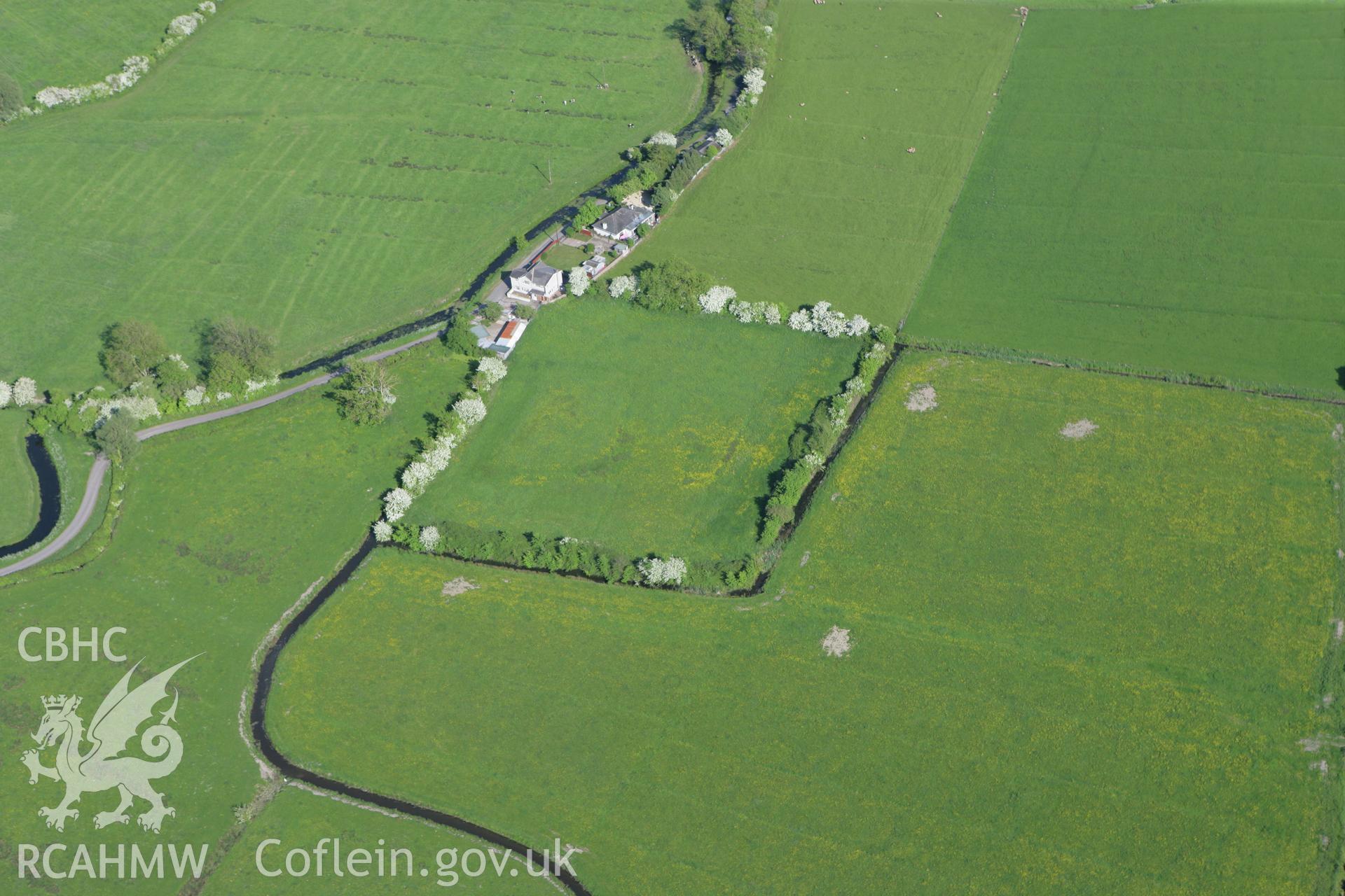 RCAHMW colour oblique photograph of Goldcliff Moated House earthwork. Taken by Toby Driver on 24/05/2010.