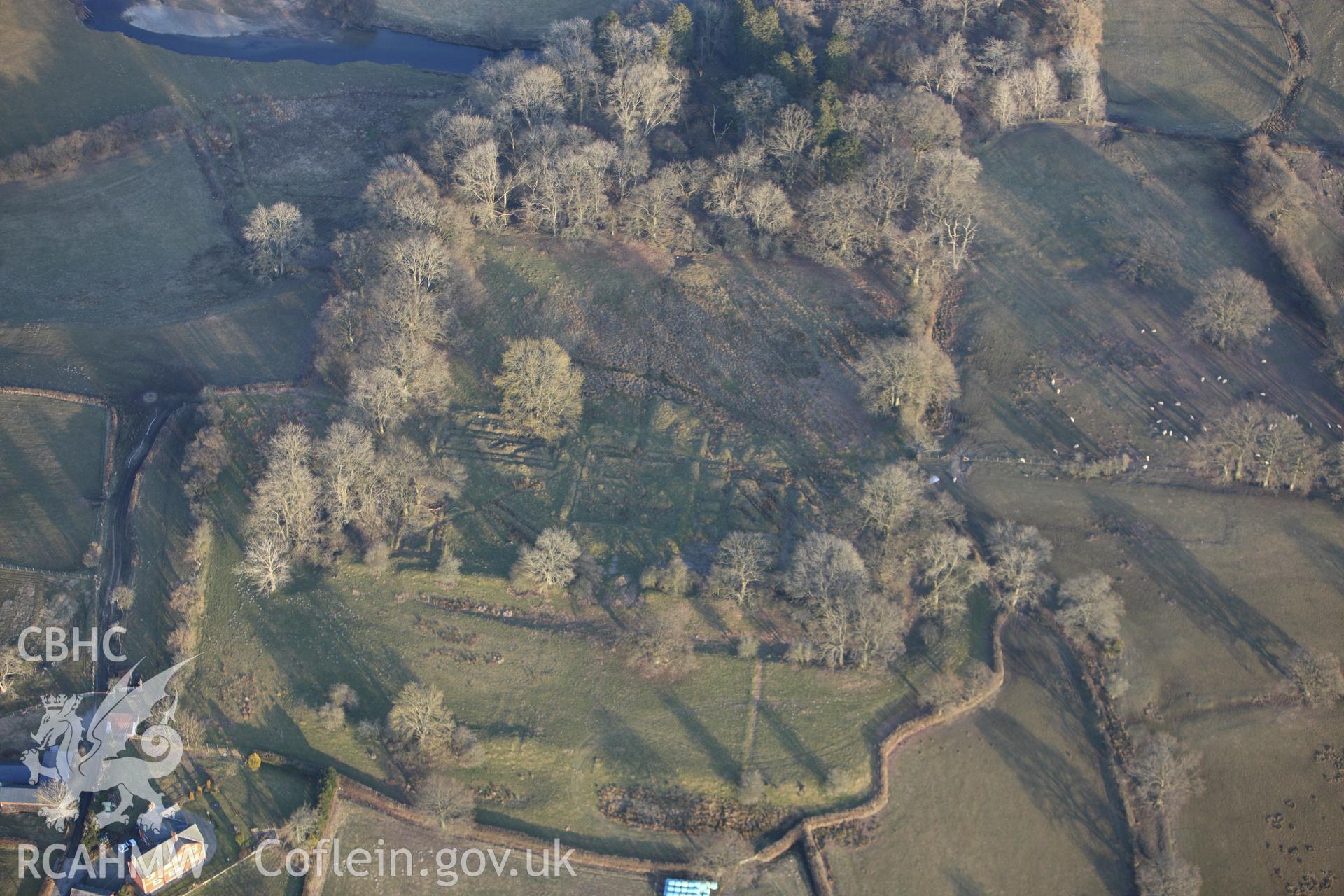 RCAHMW colour oblique photograph of Castell Collen Roman Fort. Taken by Toby Driver on 11/03/2010.