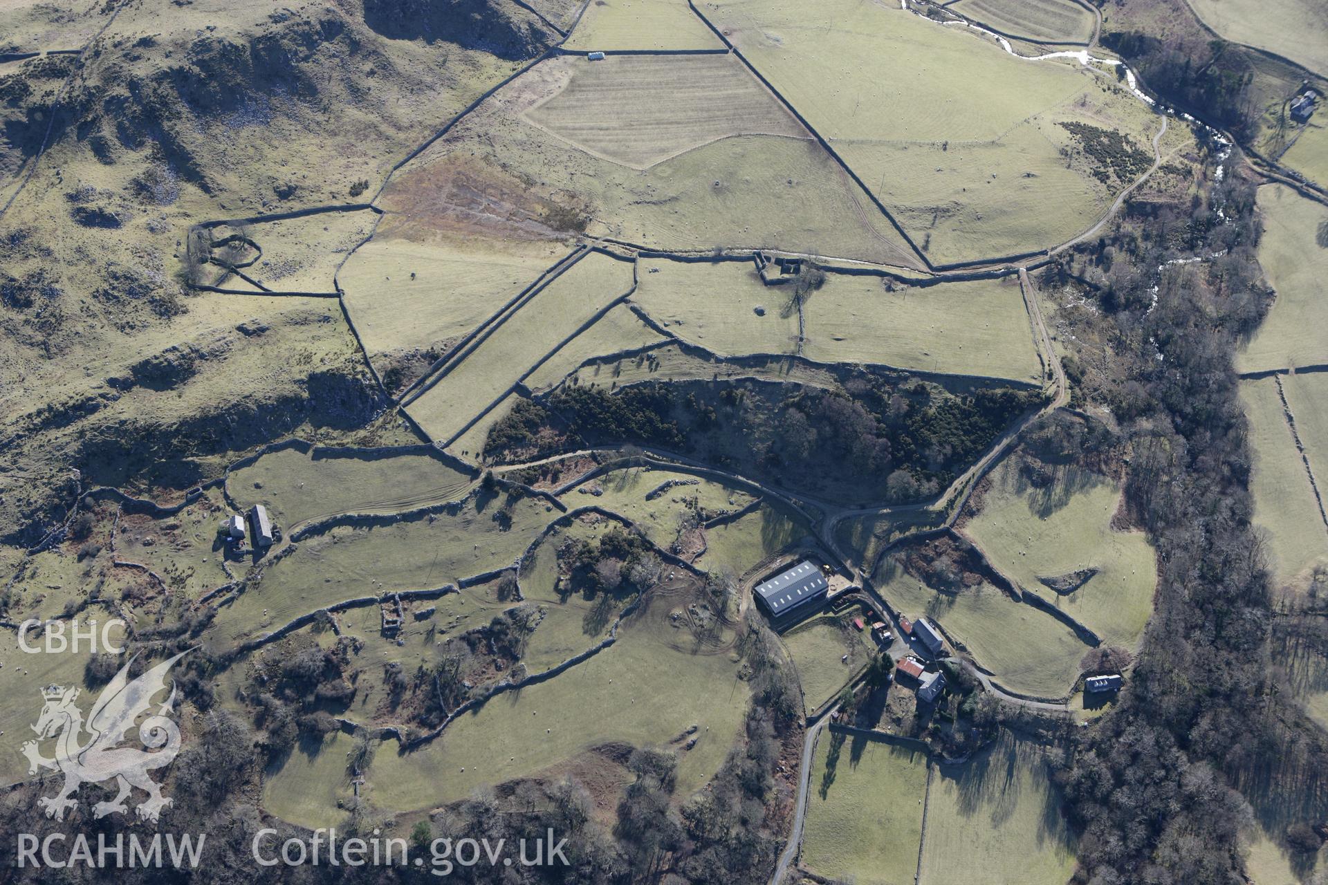 RCAHMW colour oblique photograph of Bwlch Gilbert and outlying farms. Taken by Toby Driver on 08/03/2010.