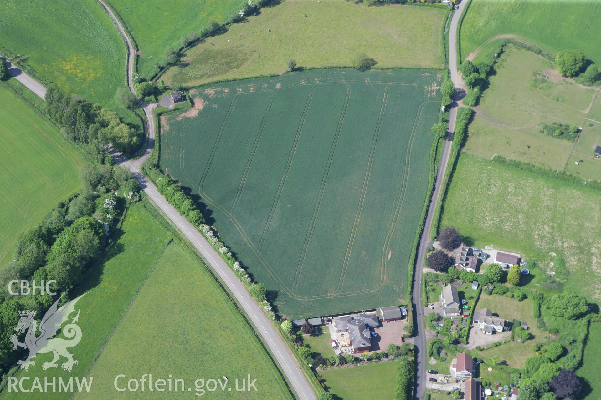 RCAHMW colour oblique photograph of Circular cropmark, Newton Green. Taken by Toby Driver on 24/05/2010.
