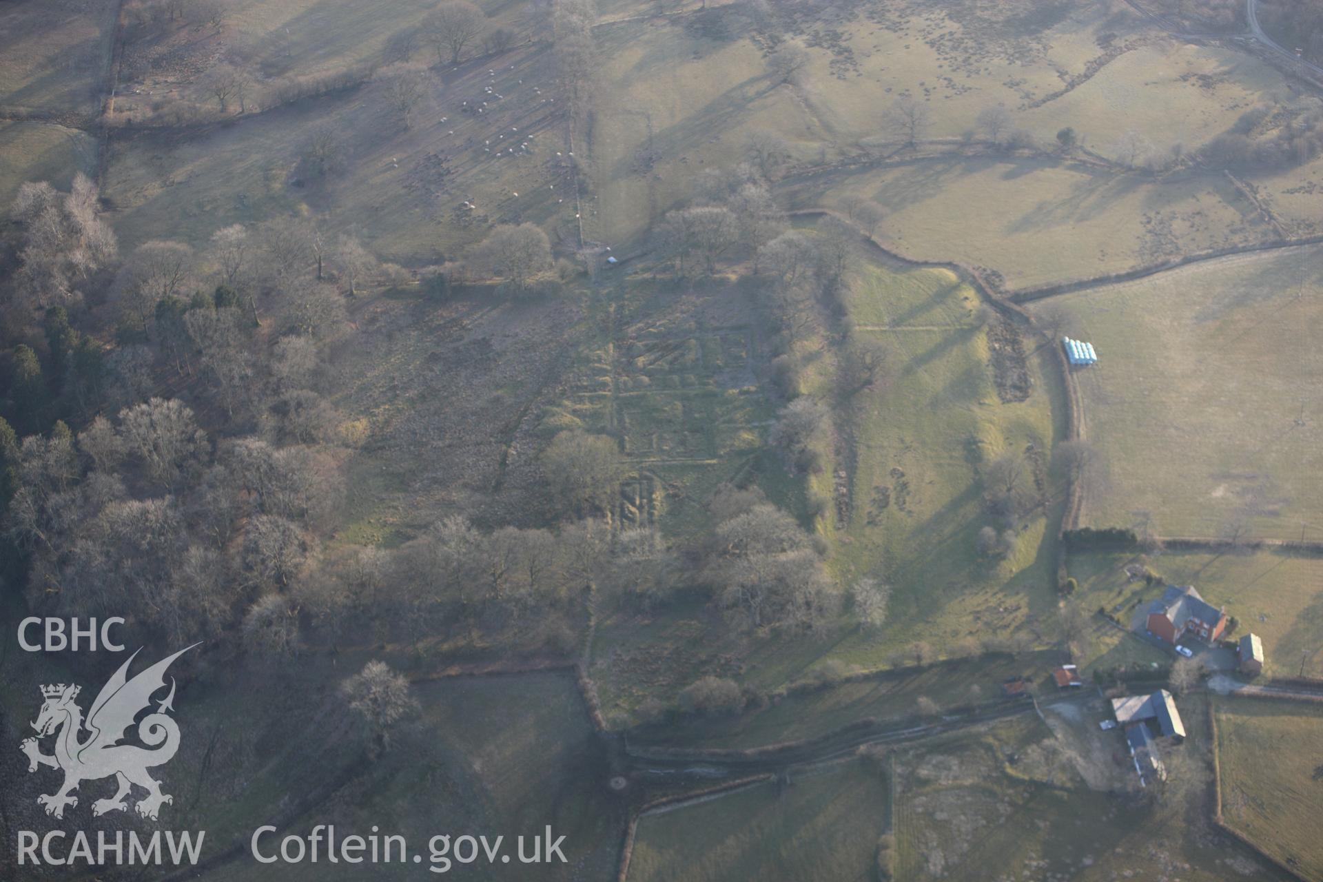 RCAHMW colour oblique photograph of Castell Collen Roman Fort. Taken by Toby Driver on 11/03/2010.