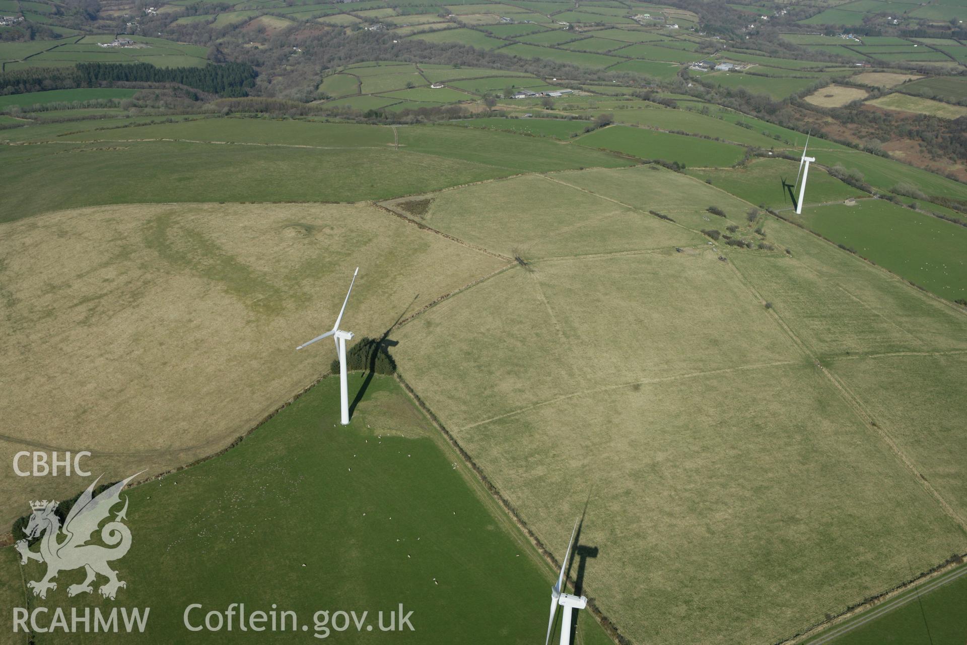 RCAHMW colour oblique aerial photograph of Moelfre Crugiau II Round Barrow. Taken on 13 April 2010 by Toby Driver