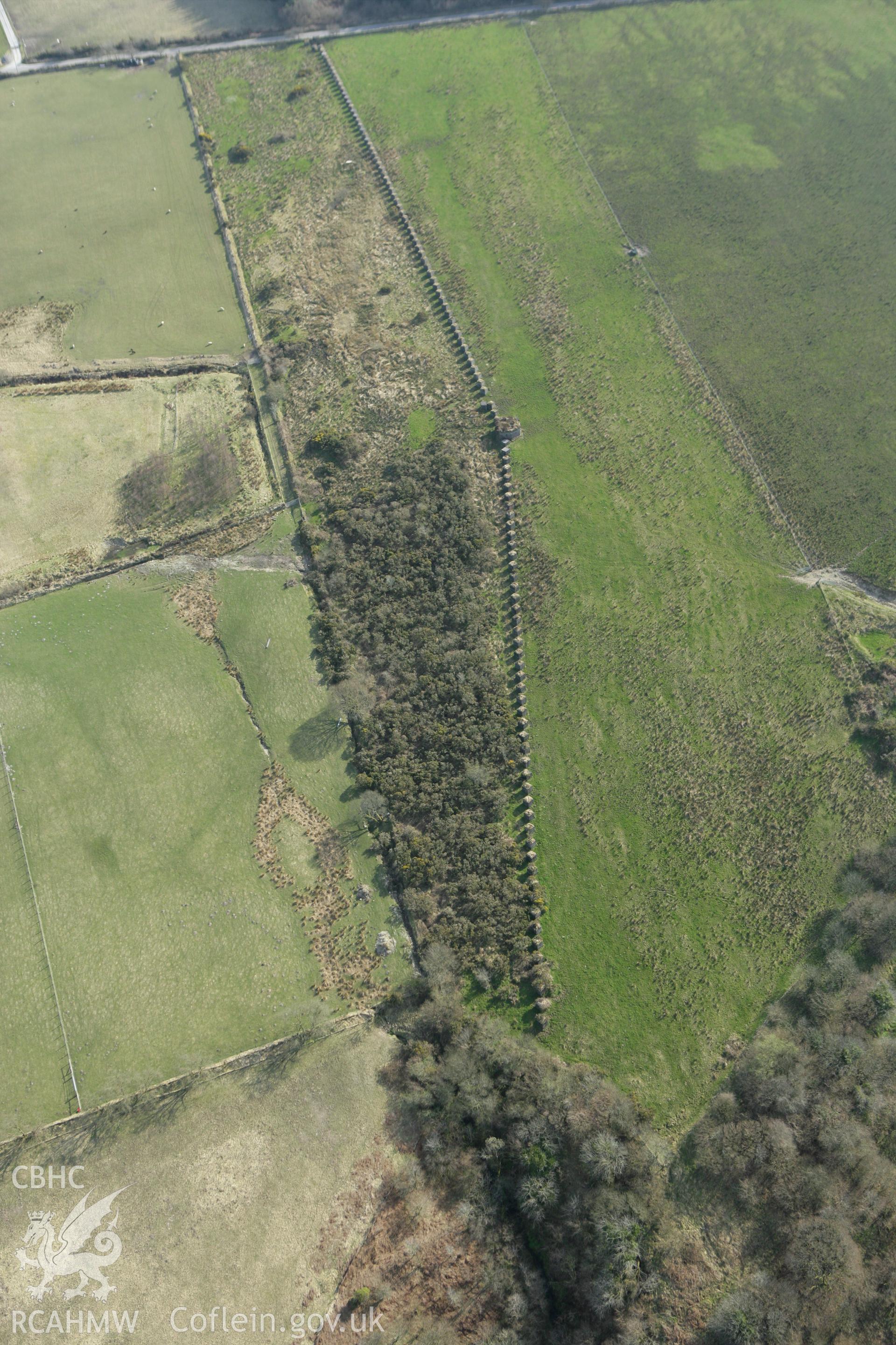 RCAHMW colour oblique aerial photograph of Rhos Llangeler Stop Line. Taken on 13 April 2010 by Toby Driver