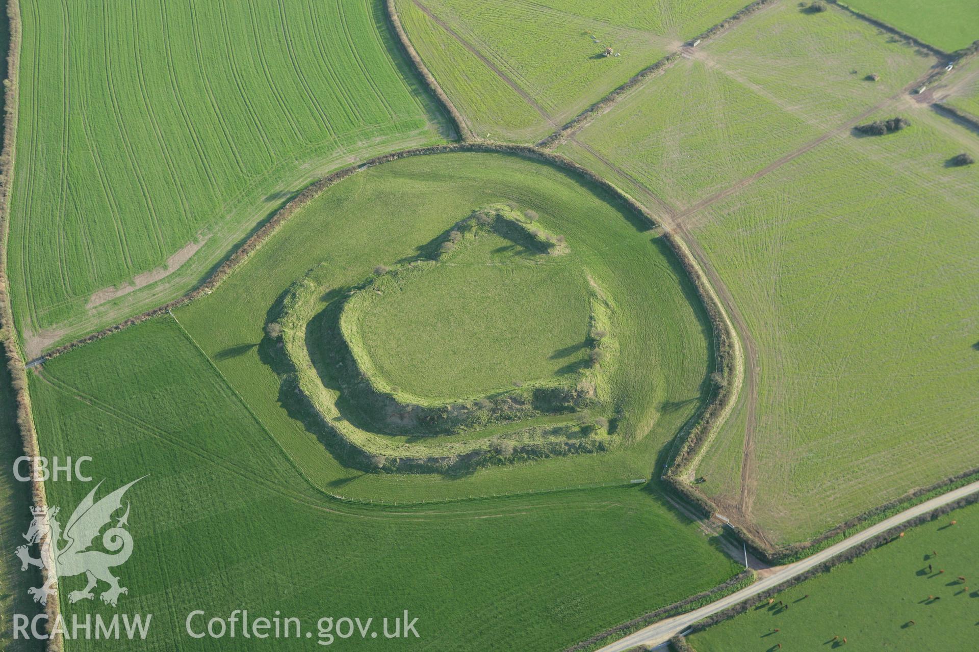 RCAHMW colour oblique aerial photograph of Romans Castle. Taken on 13 April 2010 by Toby Driver